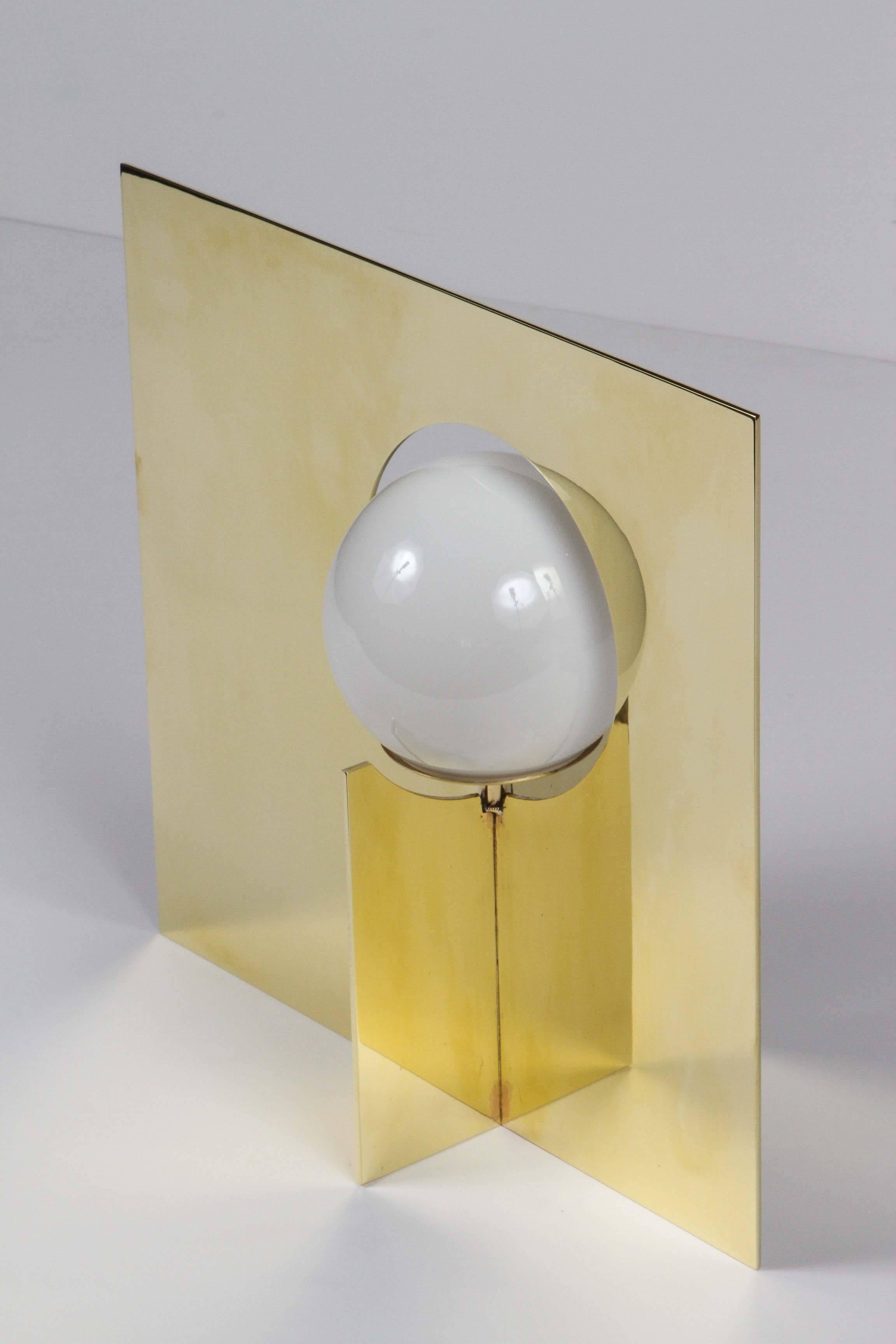 Paul Marra brass Intersection Table Lamp shown in polished unlacquered brass. Since the brass is unlacquered it will age naturally. See other listing in powder coated steel.