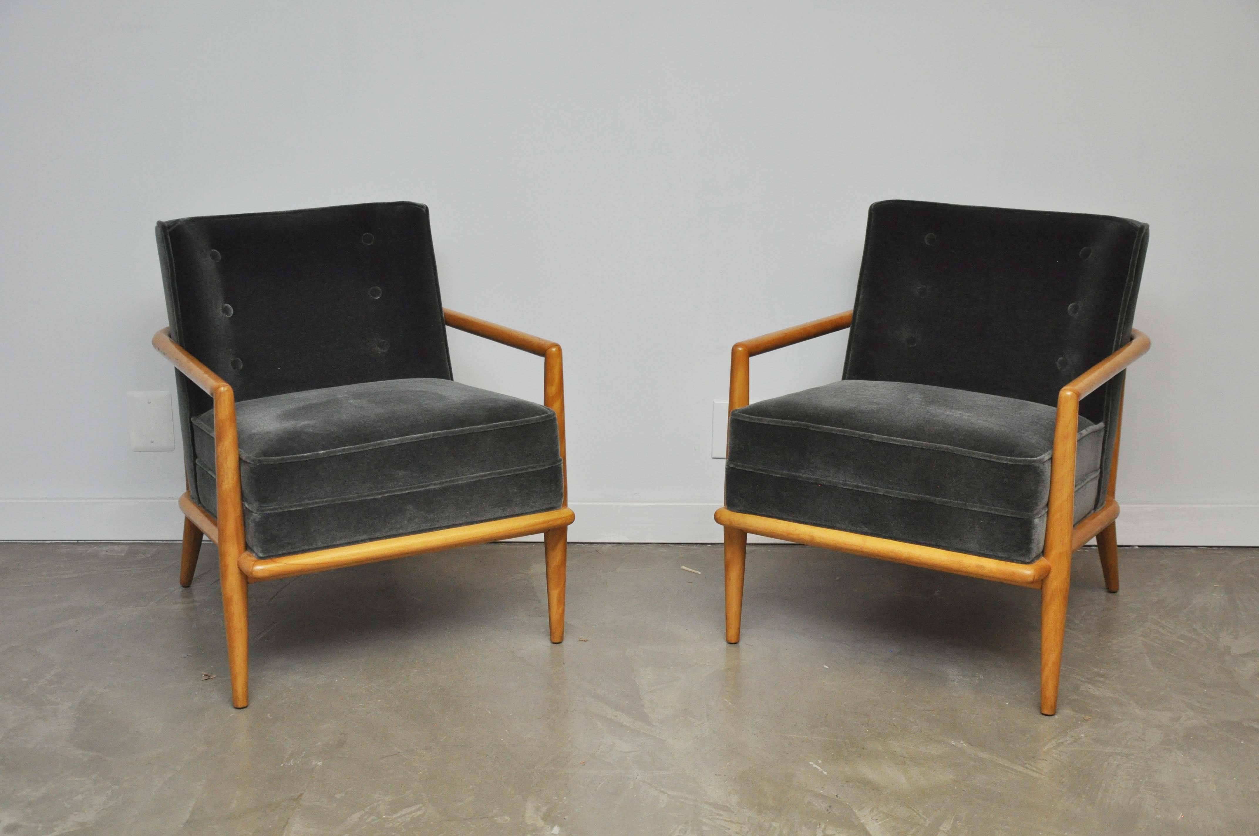 T.H. Robsjohn-Gibbings designed lounge chairs for Widdicomb. Original wood finish in excellent condition. Newly upholstered in charcoal mohair.