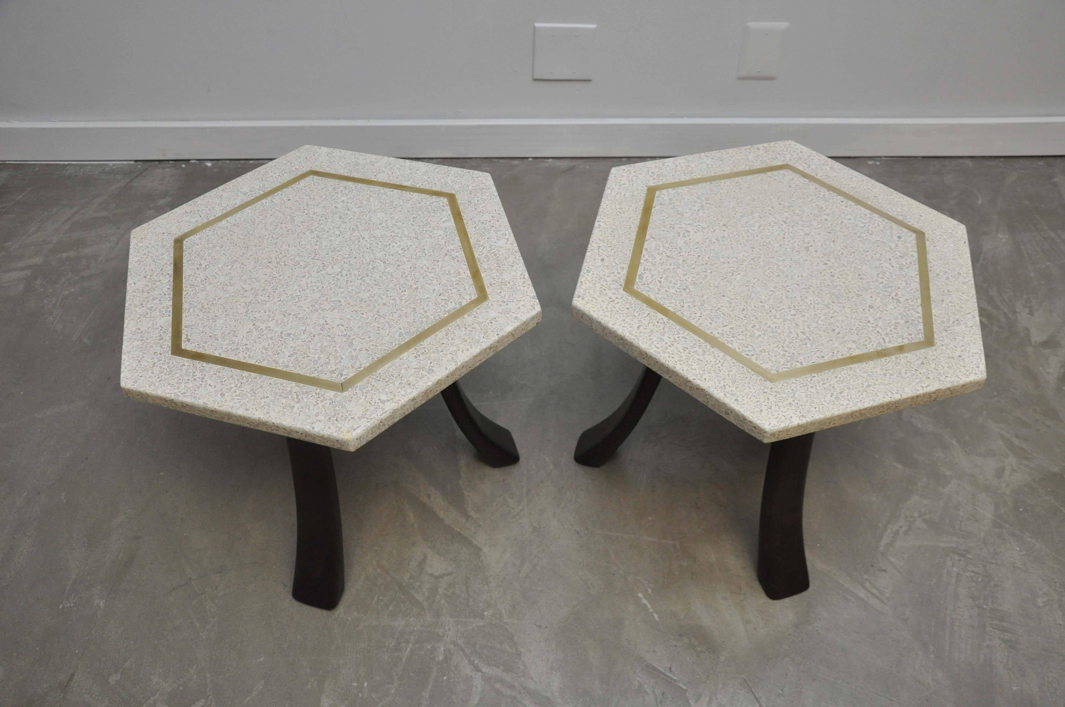 Set of three terrazzo top side tables with inlaid brass detail. Fully restored with refinished bases. Designed by Harvey Probber.