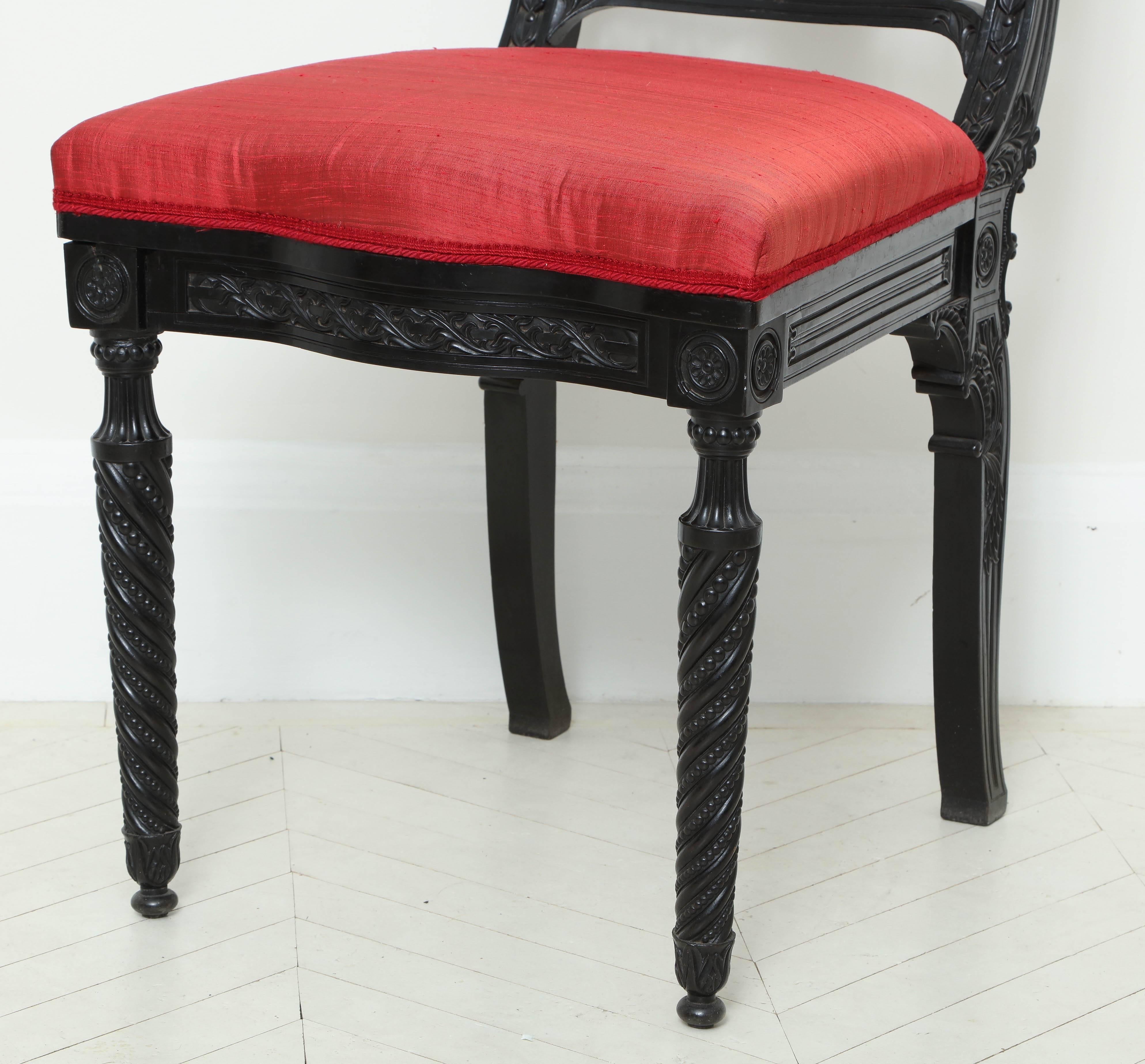 An Anglo-Indian elaborately carved ebony side chair
Sri Lanka, probably Galle District,
circa 1830-1850.
   