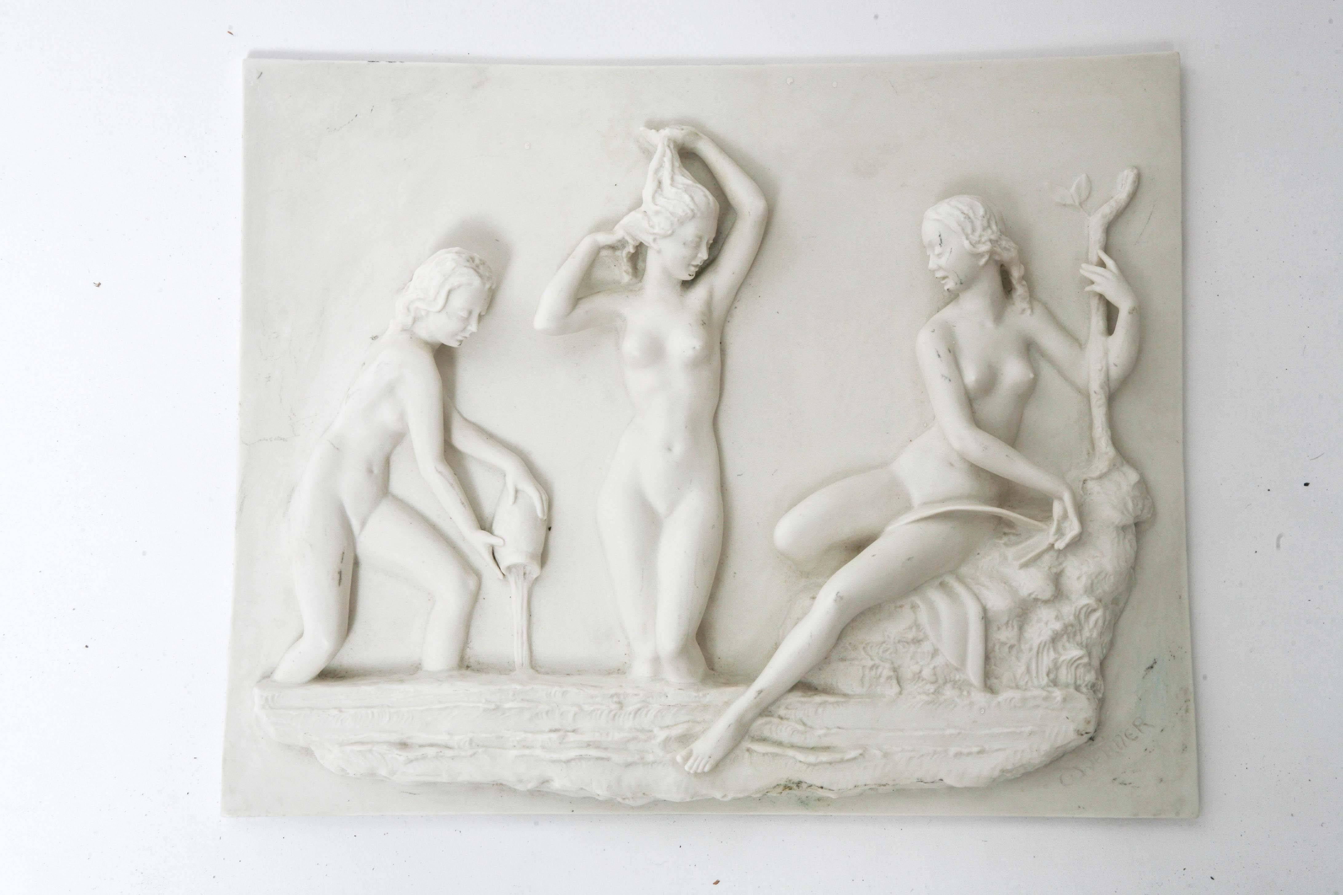 Made of bisque in high relief, this plaque features three female nudes frolicking by water side. Sculpture is a little dirty but its in very good condition. It is signed on lower right. Carl Werner is a well listed German artist / sculptor.