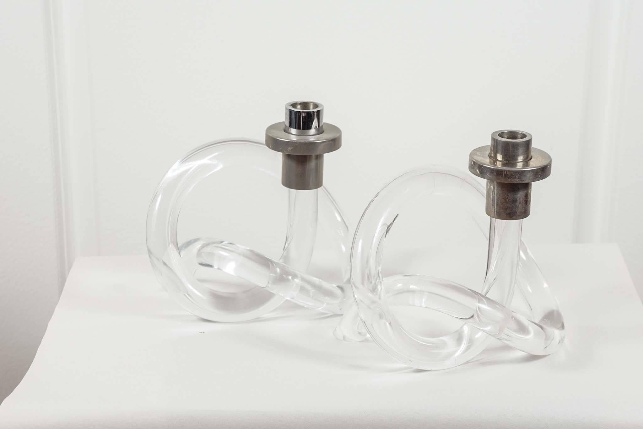 A pair of Lucite and chromed metal candlesticks by Dorothy Thorpe.