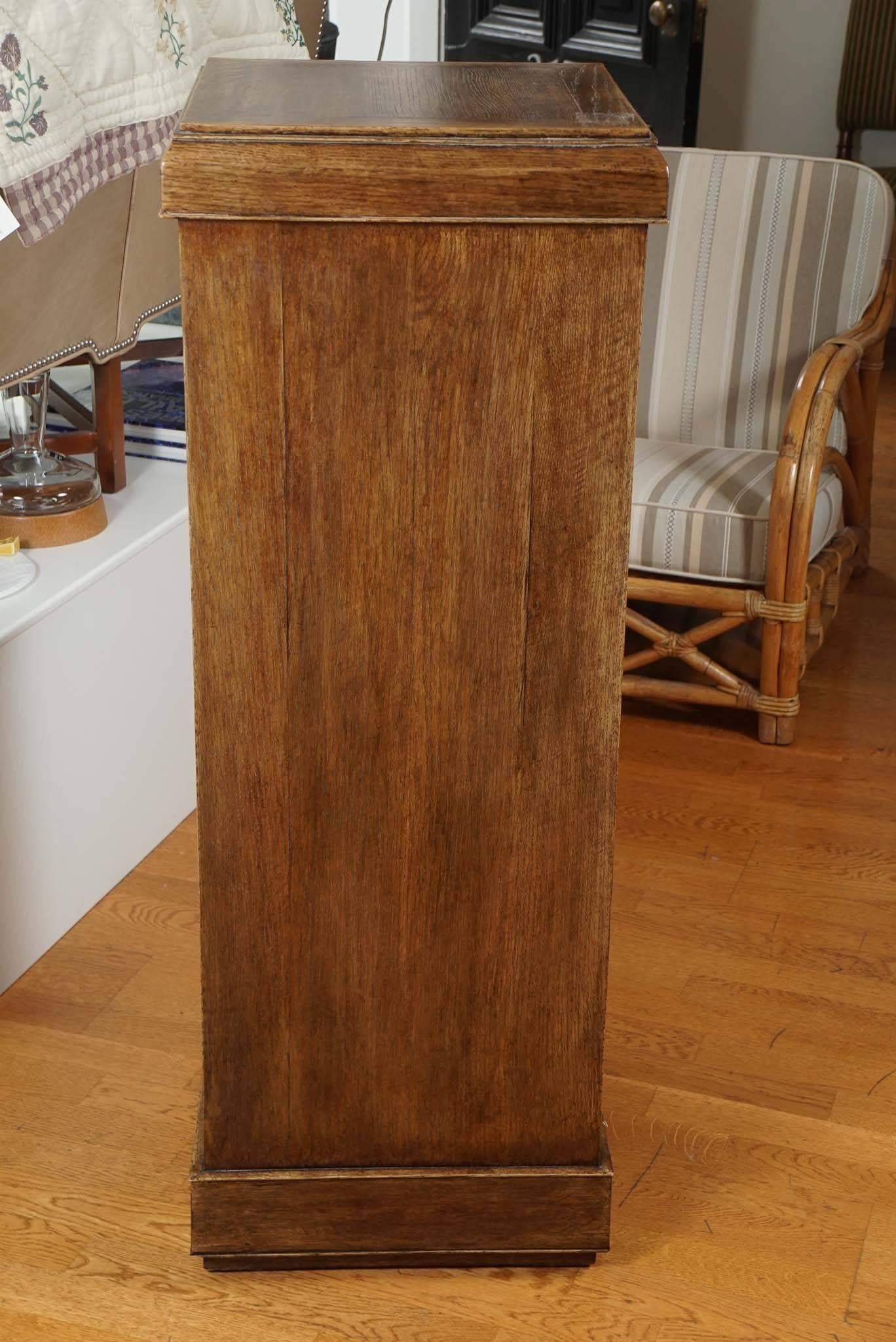 Solid oak pedestal, with beveled and mitered detailing.
Designed by Mary Cunningham.