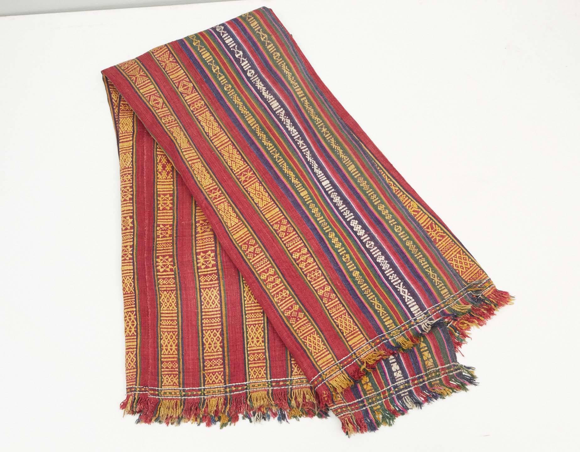 Vintage handwoven and loom brocaded cotton textile used as wrap around skirts in Bhutan.