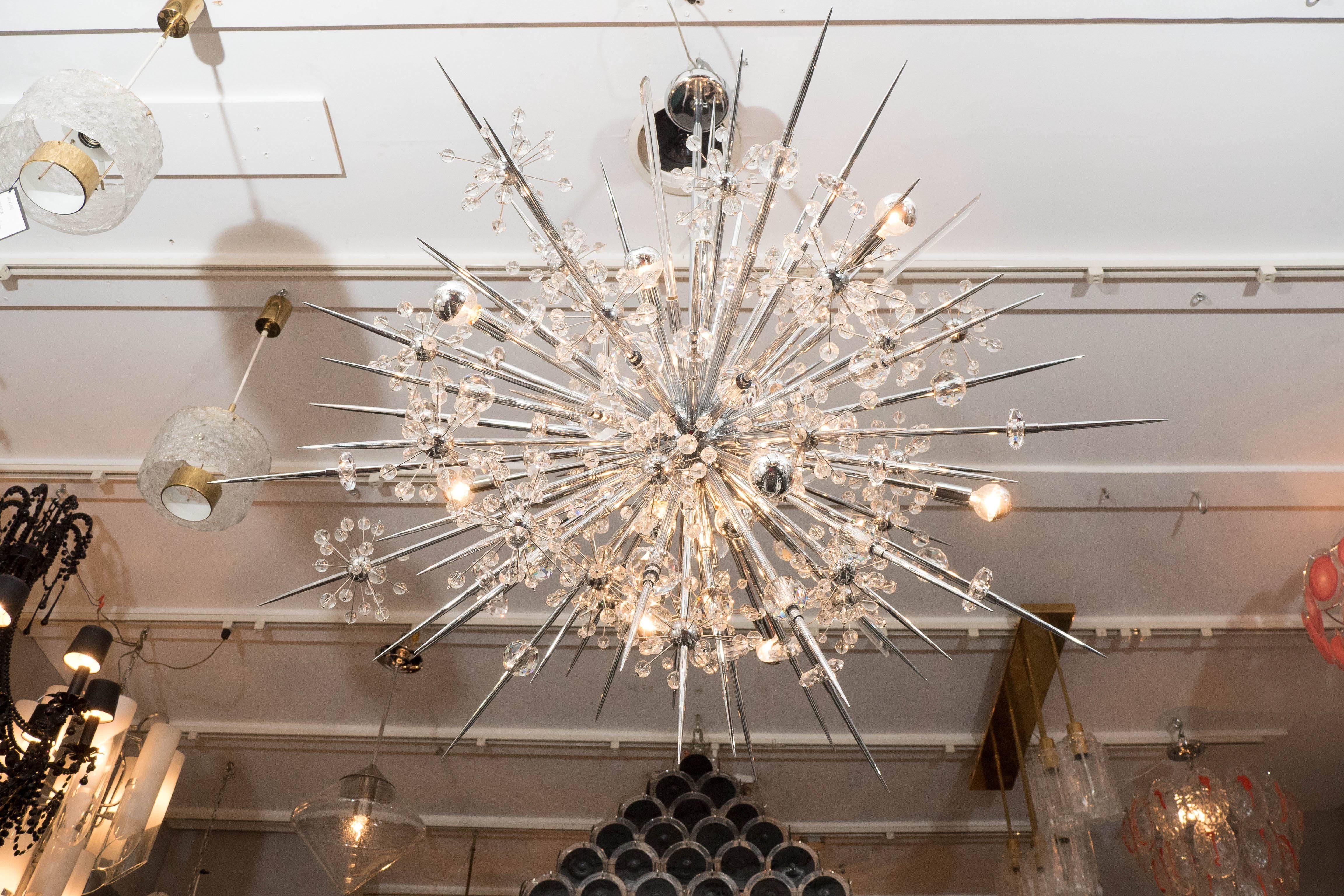 Custom Austrian crystal starburst Sputnik chandelier with polished nickel spheres and spikes. Customization is available in different sizes and finishes.