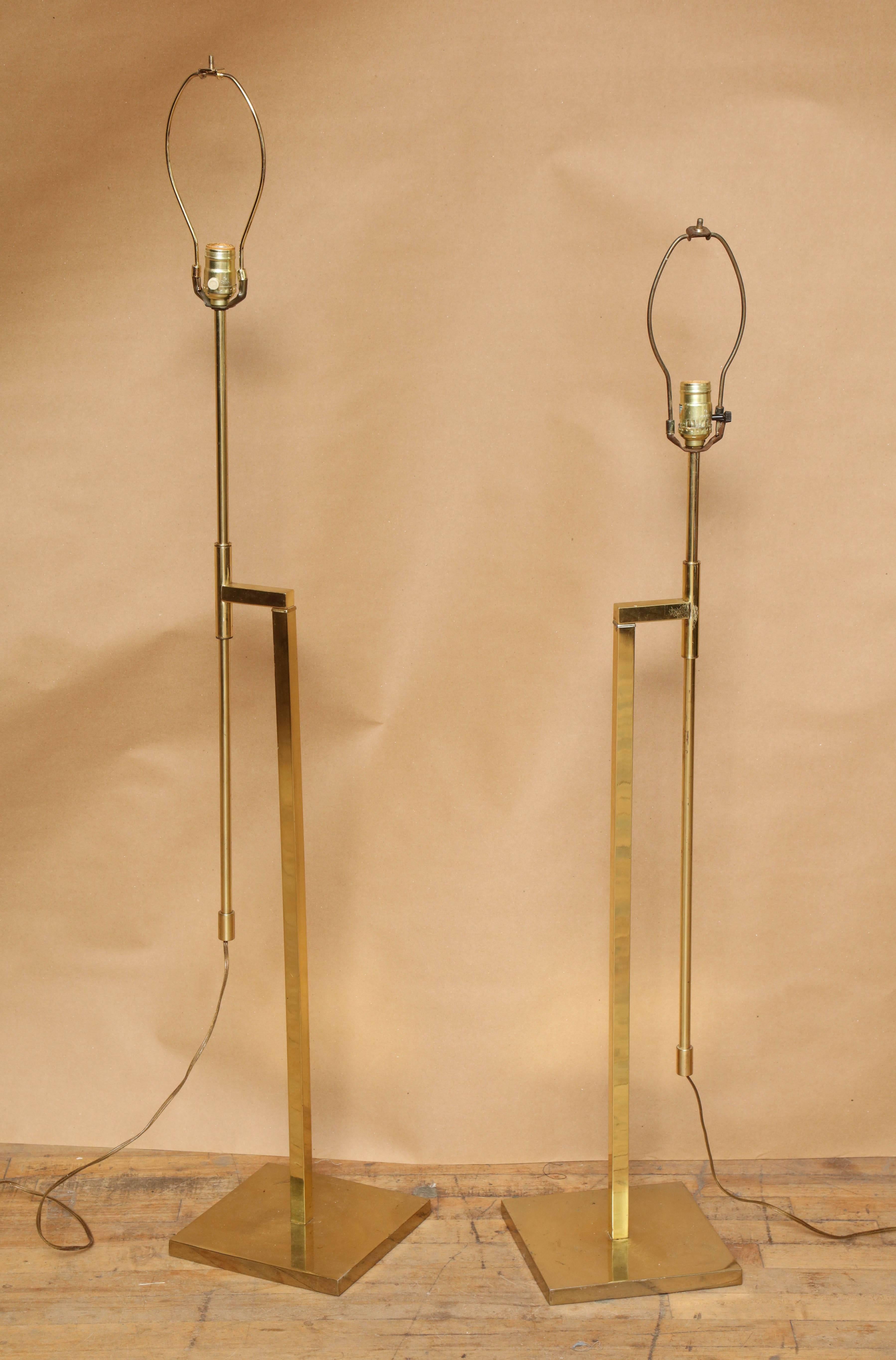 A pair of brass floor lamps by Laurel Lamp Company. Lowest height is 42