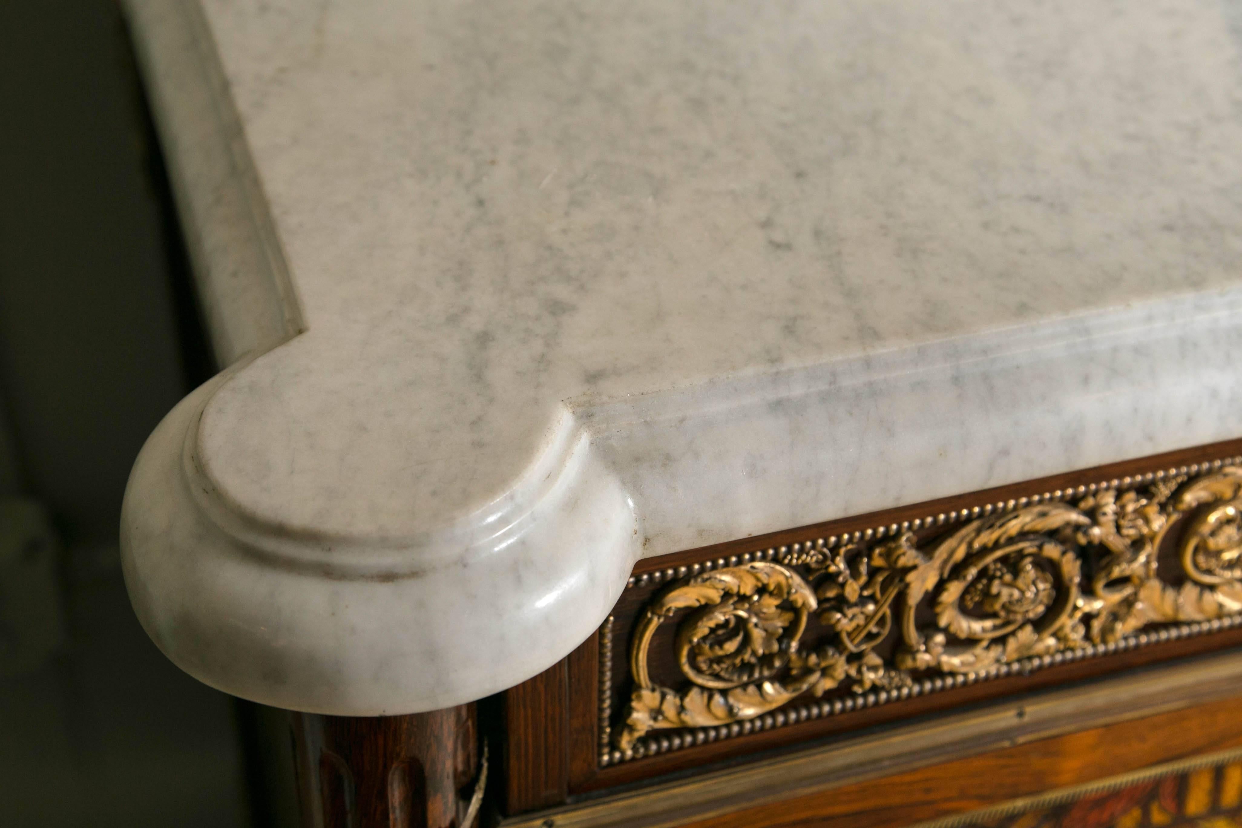 Pair of monumental compatible French commode chests. This pair of magnificent chests are certain to never be found again. The overall cabinets in a very fine walnut casing having all over Chinoiserie style decorated panels. Each on Louis XVI