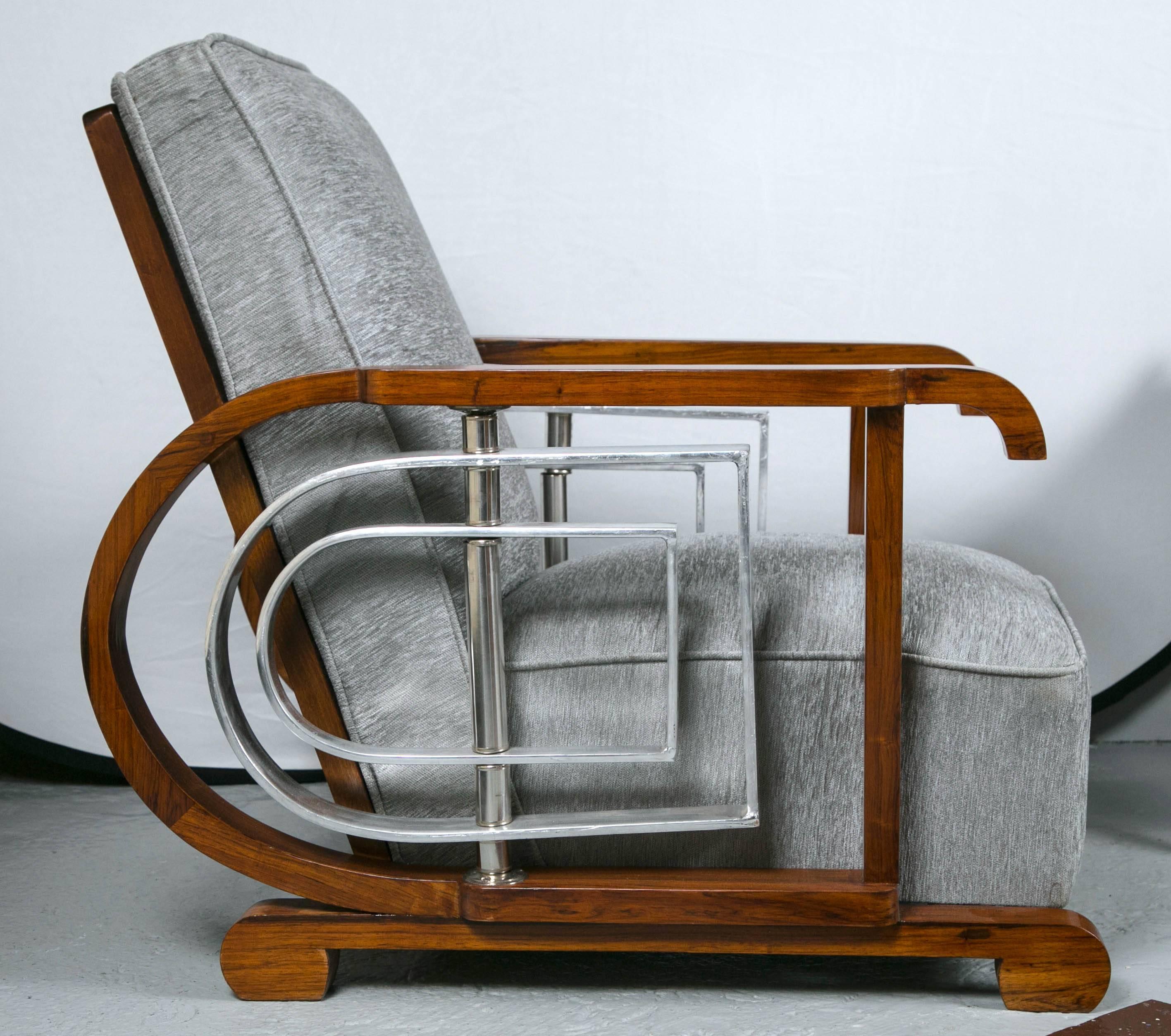 Pair of Mid-Century Modern Art Deco style lounge/ theater chairs. An outstanding set of 10 (two in this listing) Art Deco inspired lounge or theater chairs from the Mid-Century Modern era. Each having all new fabric with new cushions, back rest,