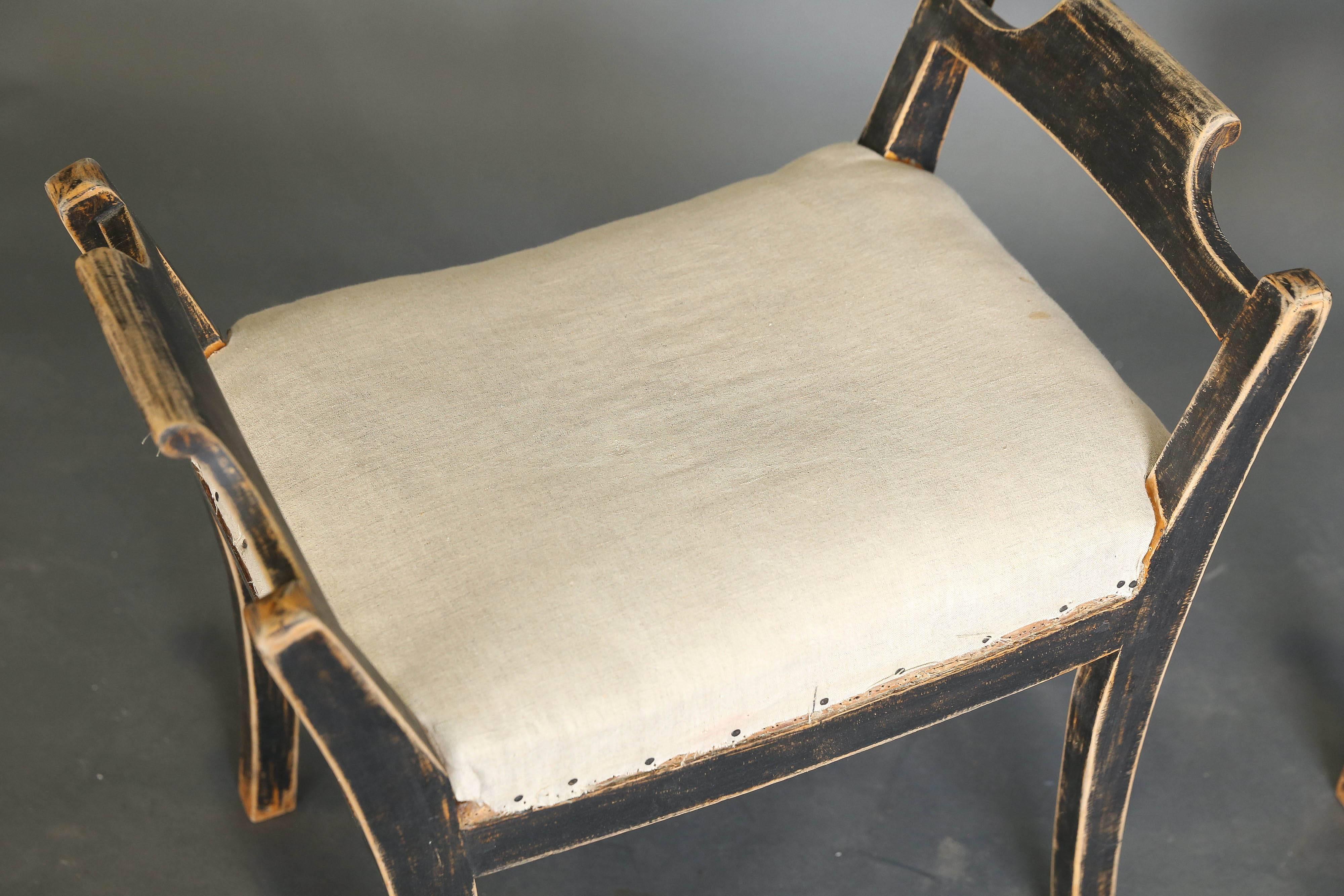 Pair of 19th century Swedish stools with original upholstery.