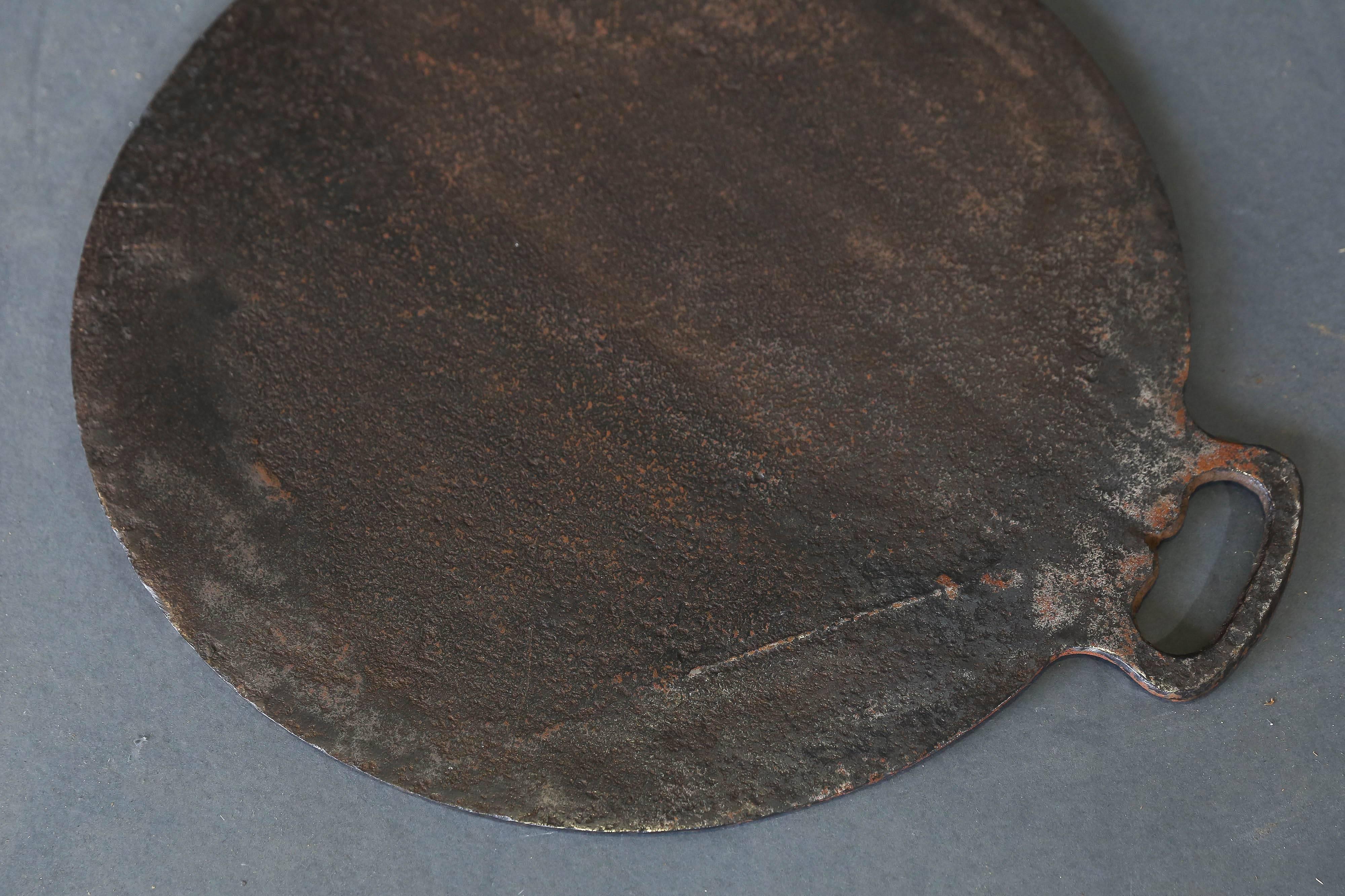 19th century cast iron crepe pan.