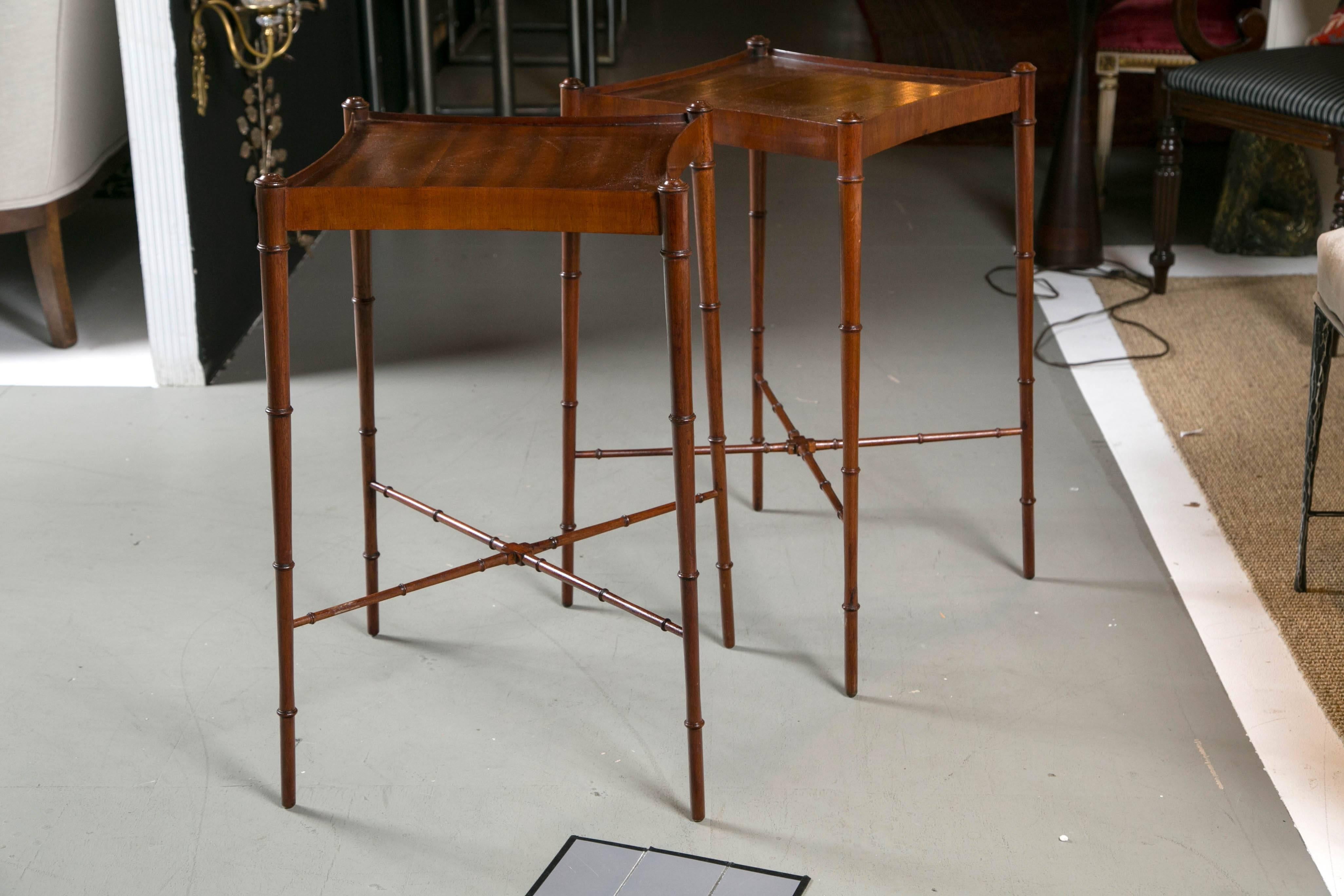 Beautiful pair of faux bamboo end tables with splayed legs with crossed stretchers very delicate profile.