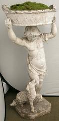 Statue of a Boy Holding a Planter Basket