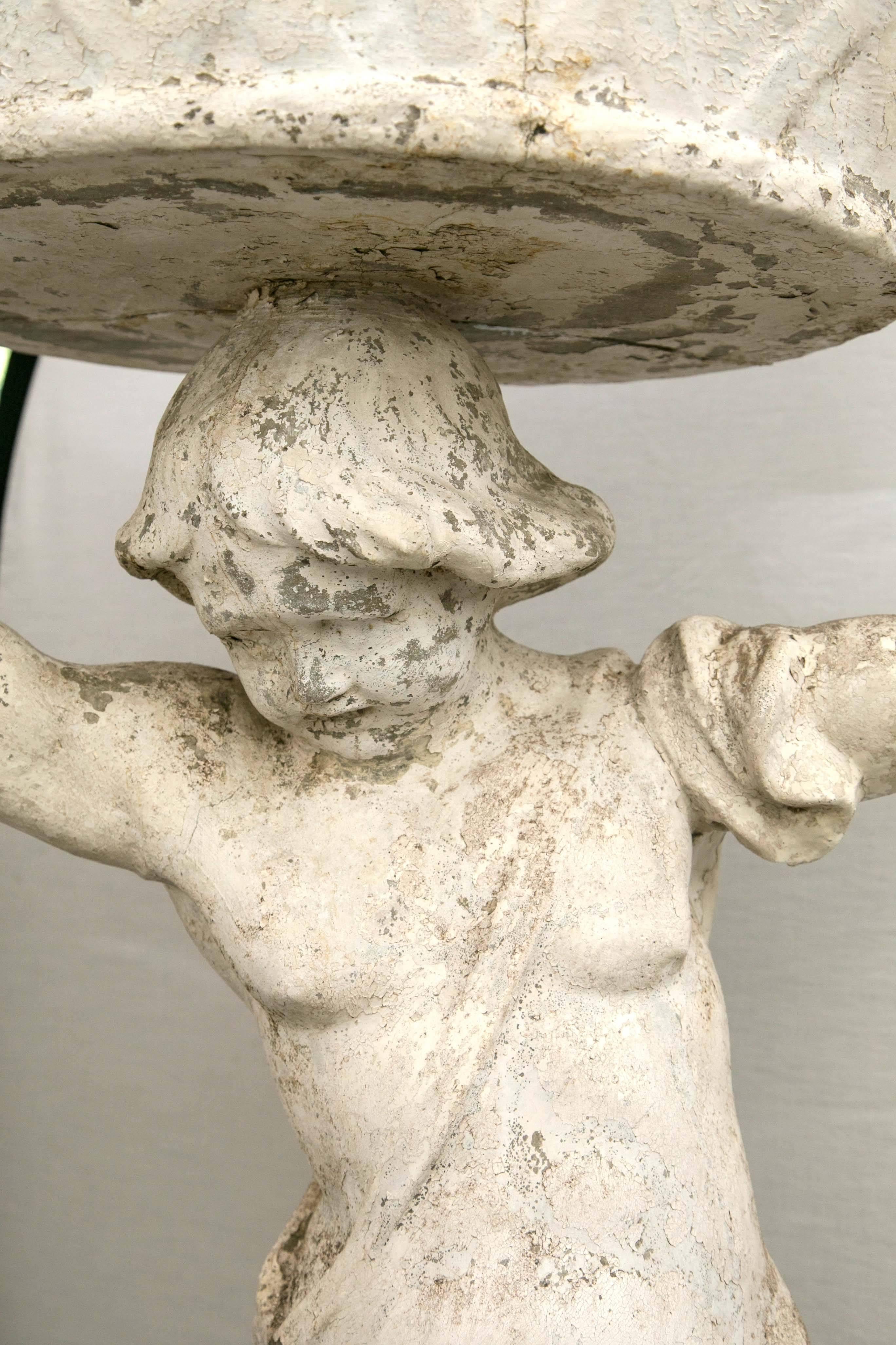 French Statue of a Boy Holding a Planter Basket For Sale