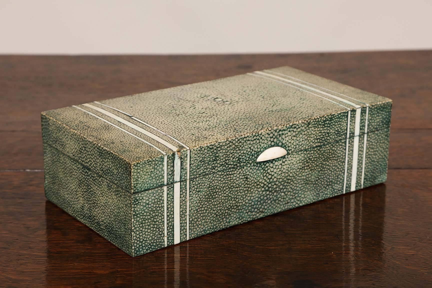 Fine vintage deco green shagreen covered box with bone stringing and inlay, the pale wood interior with silvered fittings.