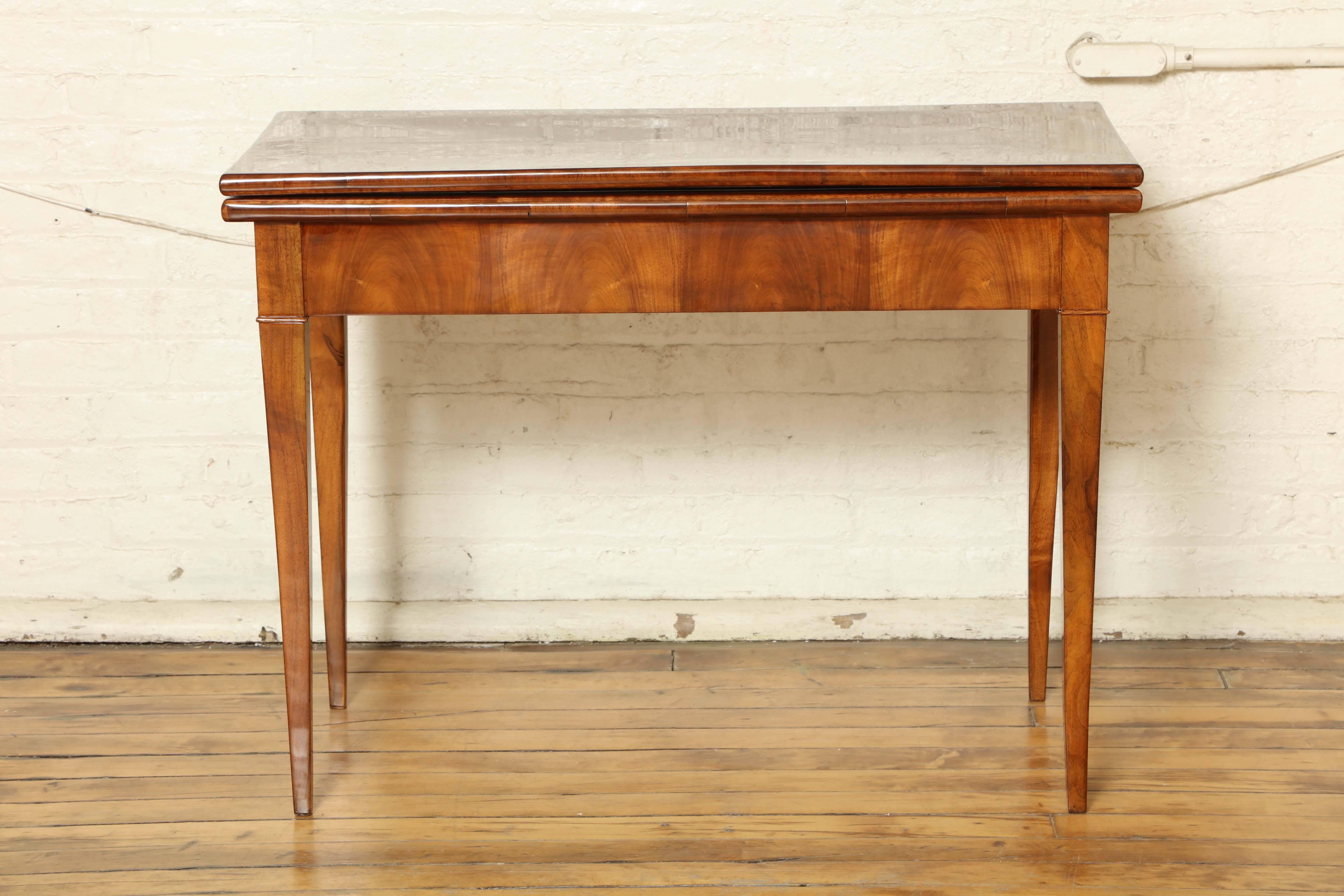 Art Deco console table opens up to a full size games/card table with leather top.
When closed as a console table it is approx. 34" x 17" x 30.5".
When open as a games table it is approx. 34" x 34" x 29.75".
Palisander