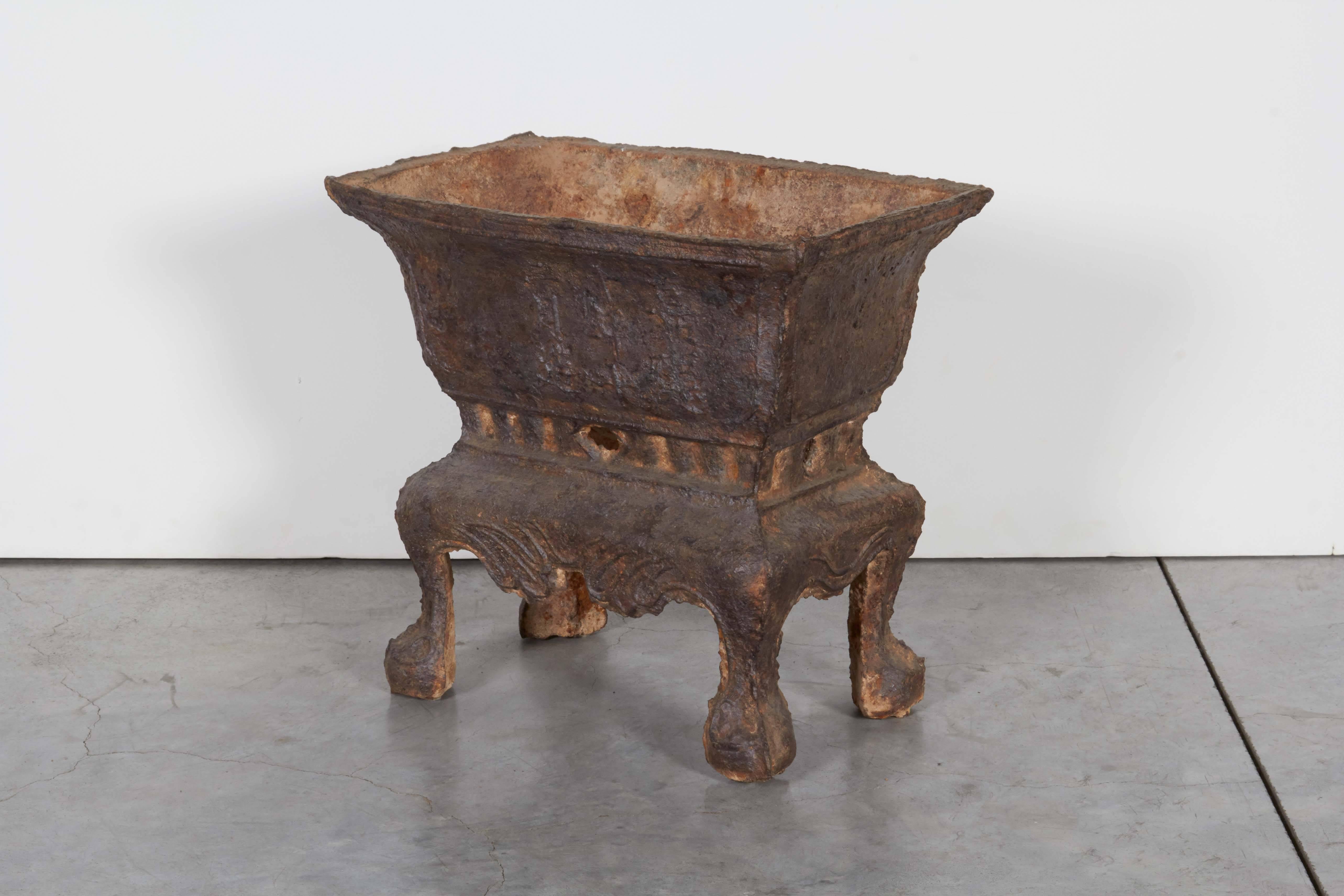 A large and exquisitely detailed early 19th century cast iron incense burner raised on four graceful legs with clear Chinese characters. From Shanxi Province, circa 1800.
M599.
 