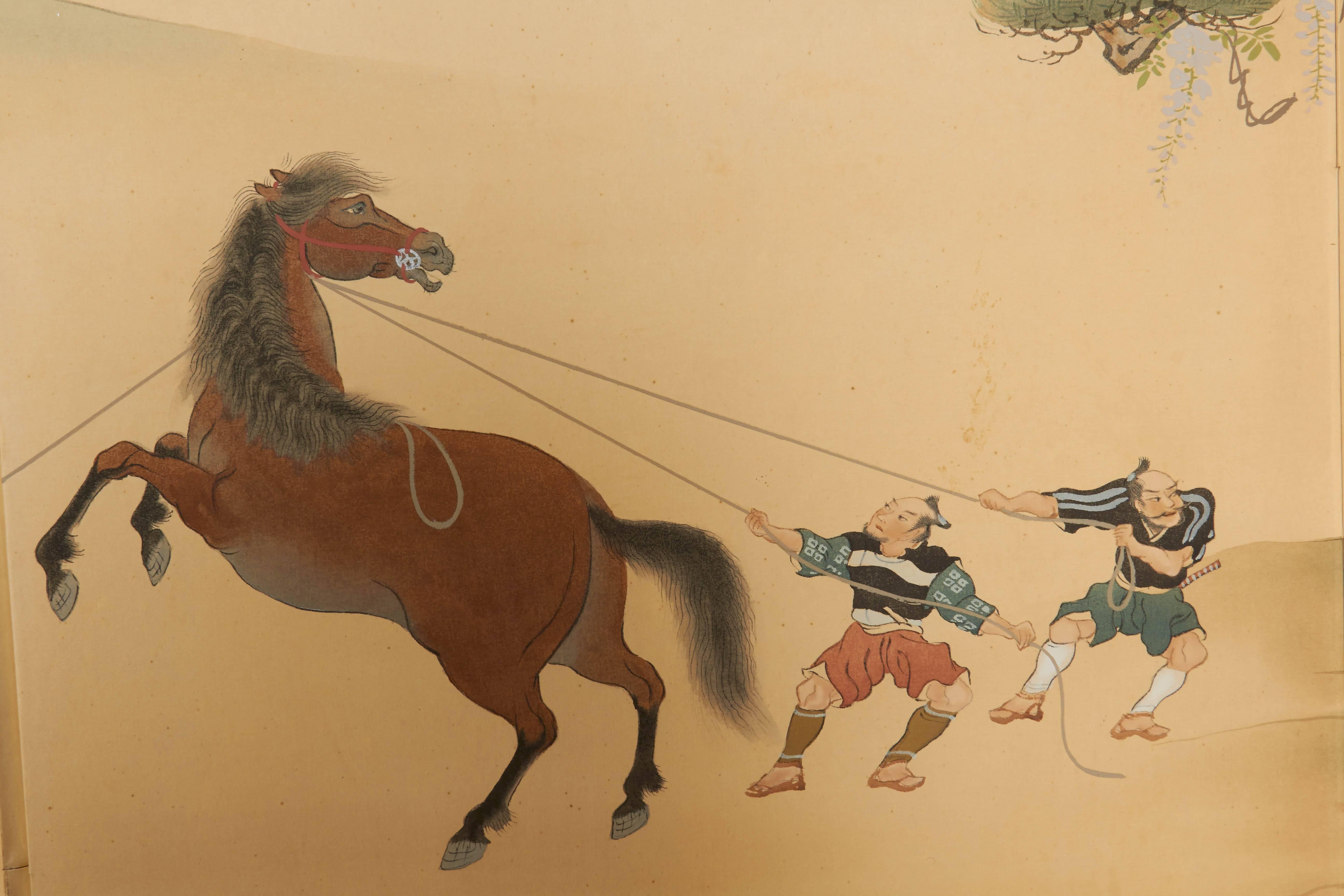 Japanese Early 20th Century Four-Panel Screen of Riders Taming Horses In Good Condition For Sale In New York, NY