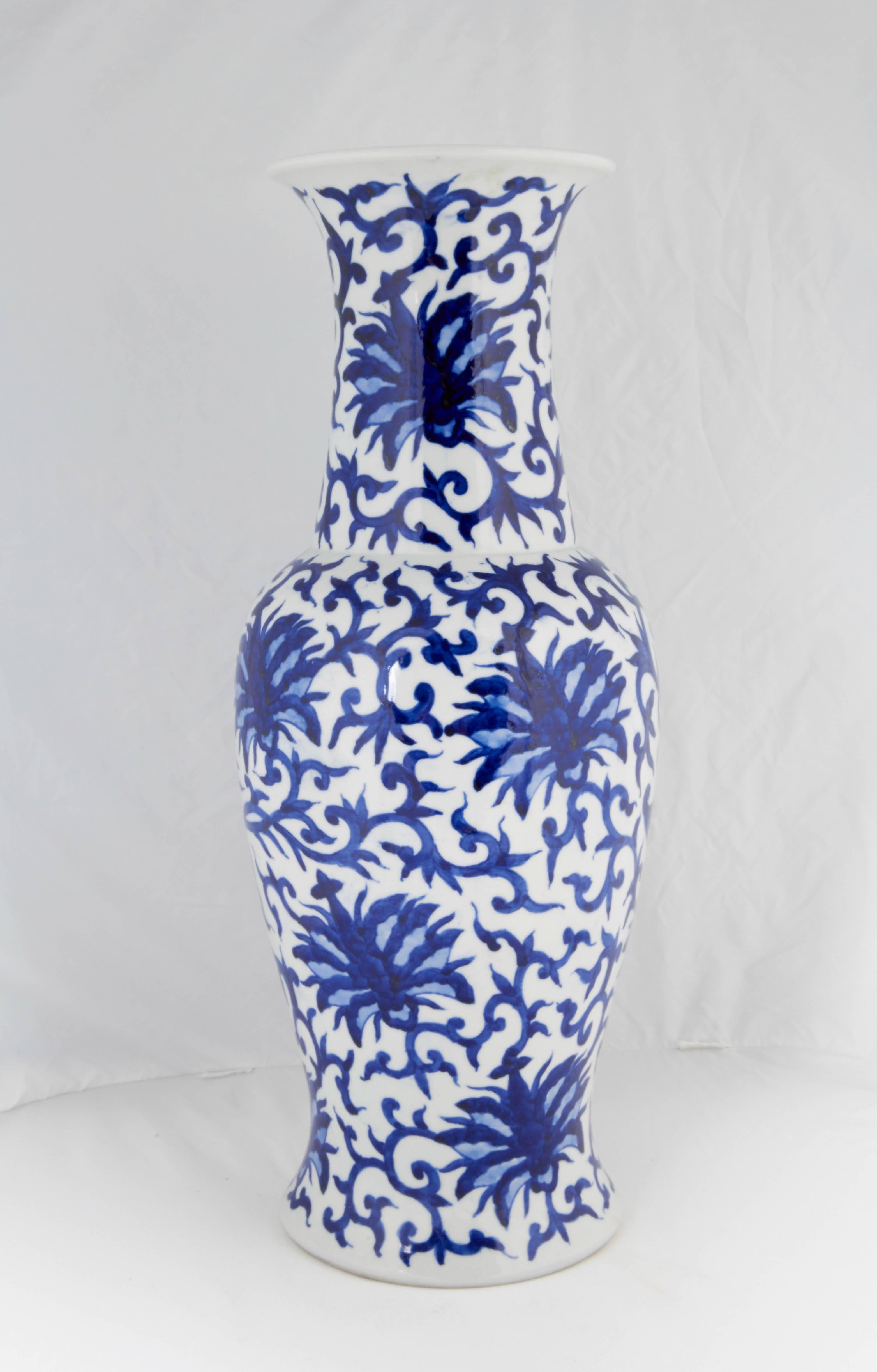 Glazed Pair of Chinese White and Blue Ceramic Vases with Floral Motifs