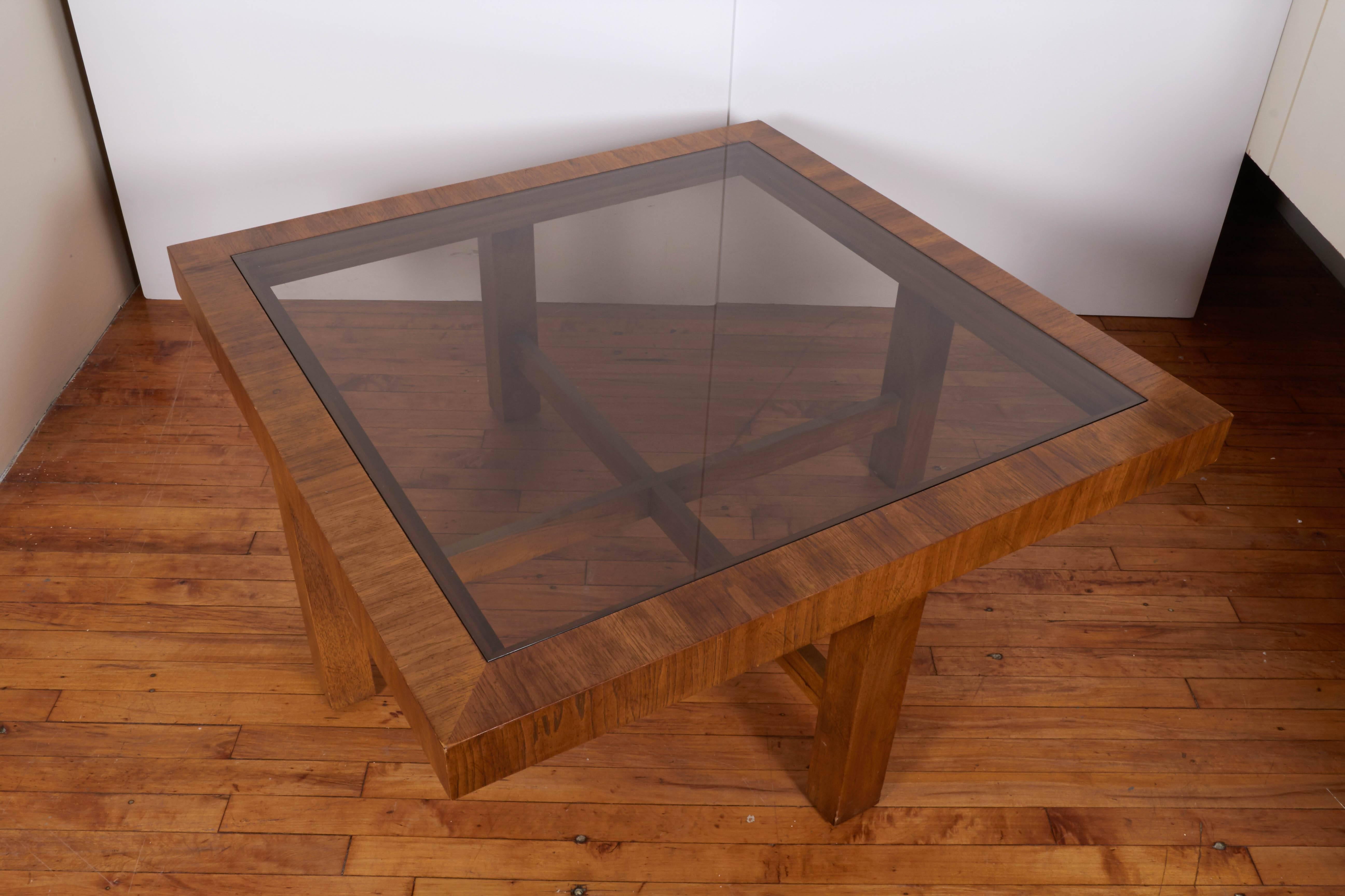 glass coffee table with ottomans underneath