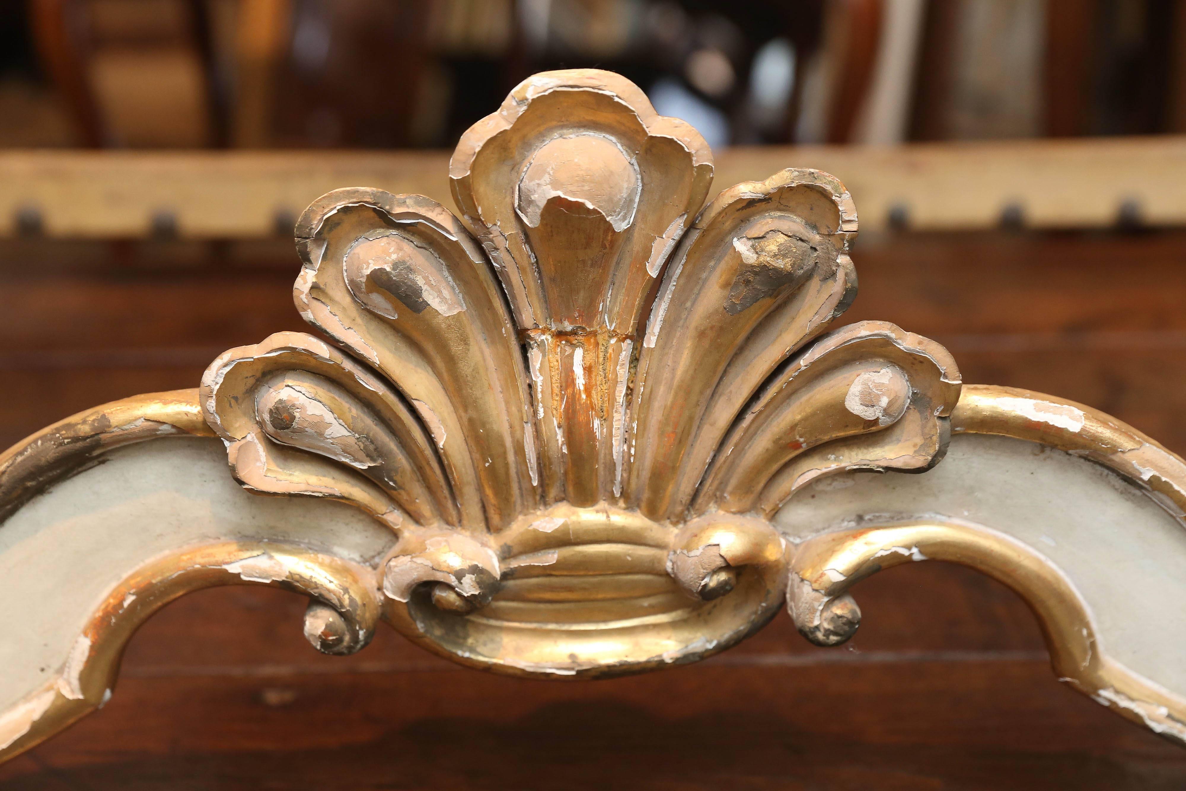 19th century carved wooden canopy or couronne from France. Paint and giltwood.