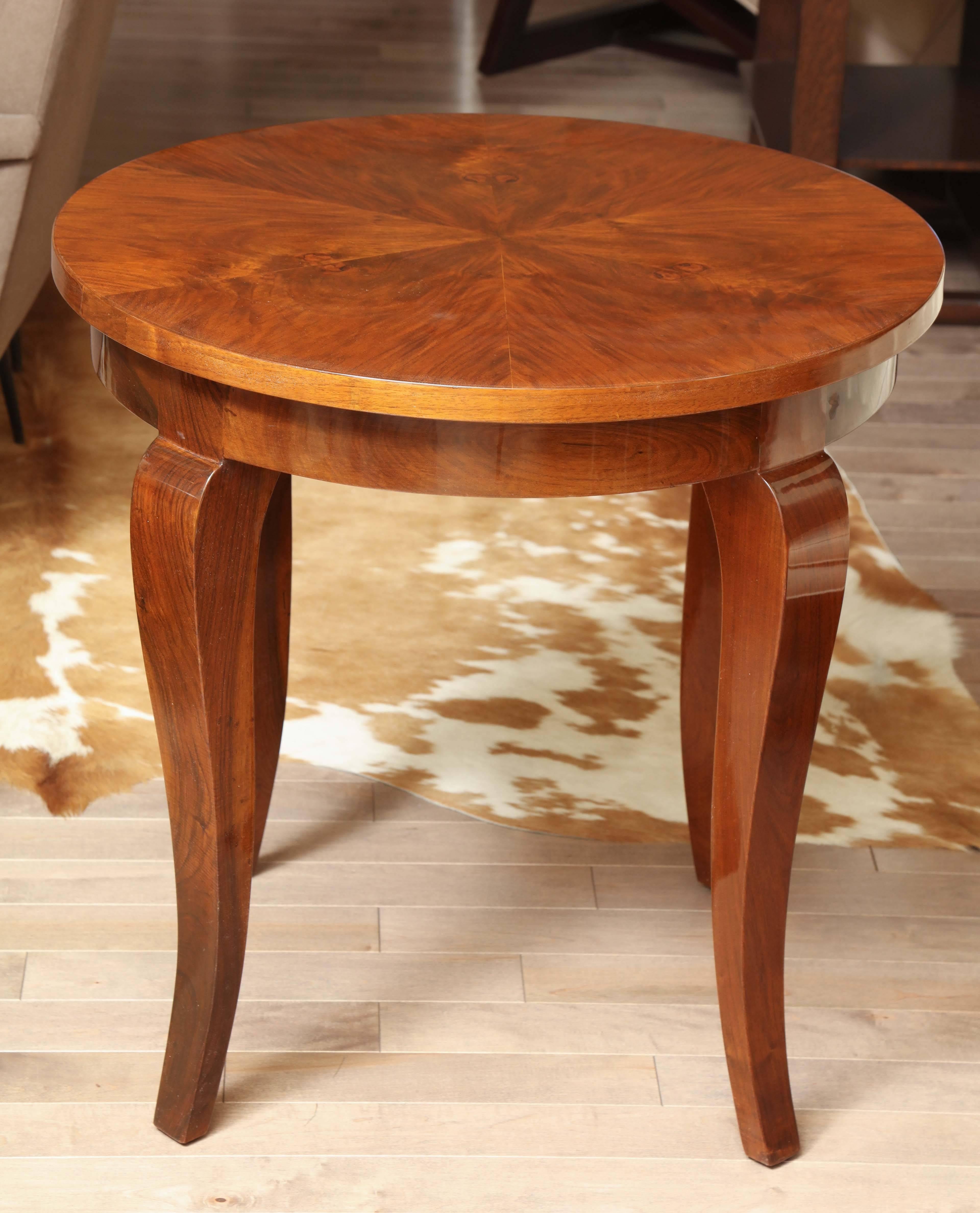 Moderne side table in a rich high-gloss finish, circa 1940.
