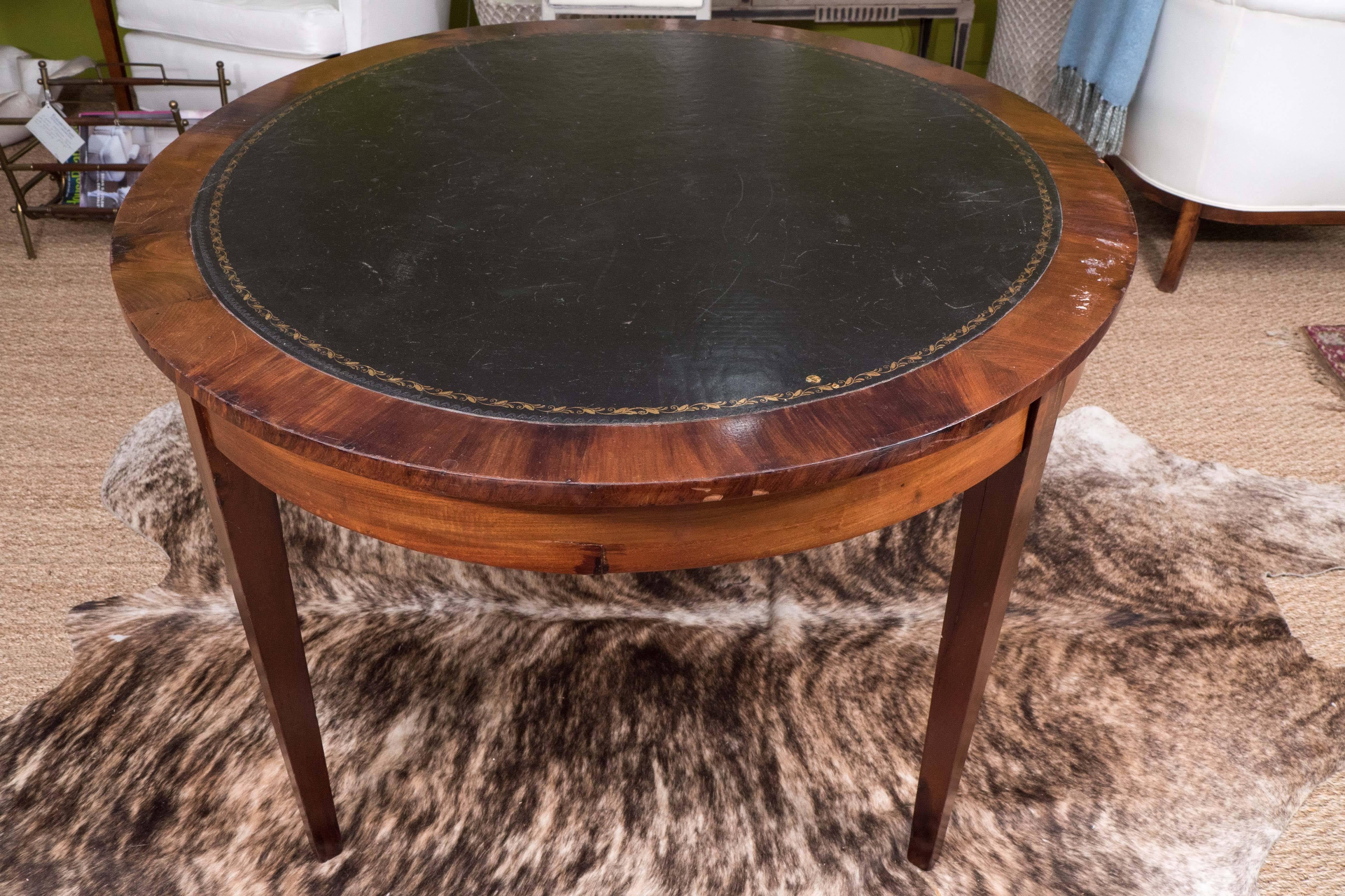 A 19th-Century Mahogany Table with Black Leather Top 1