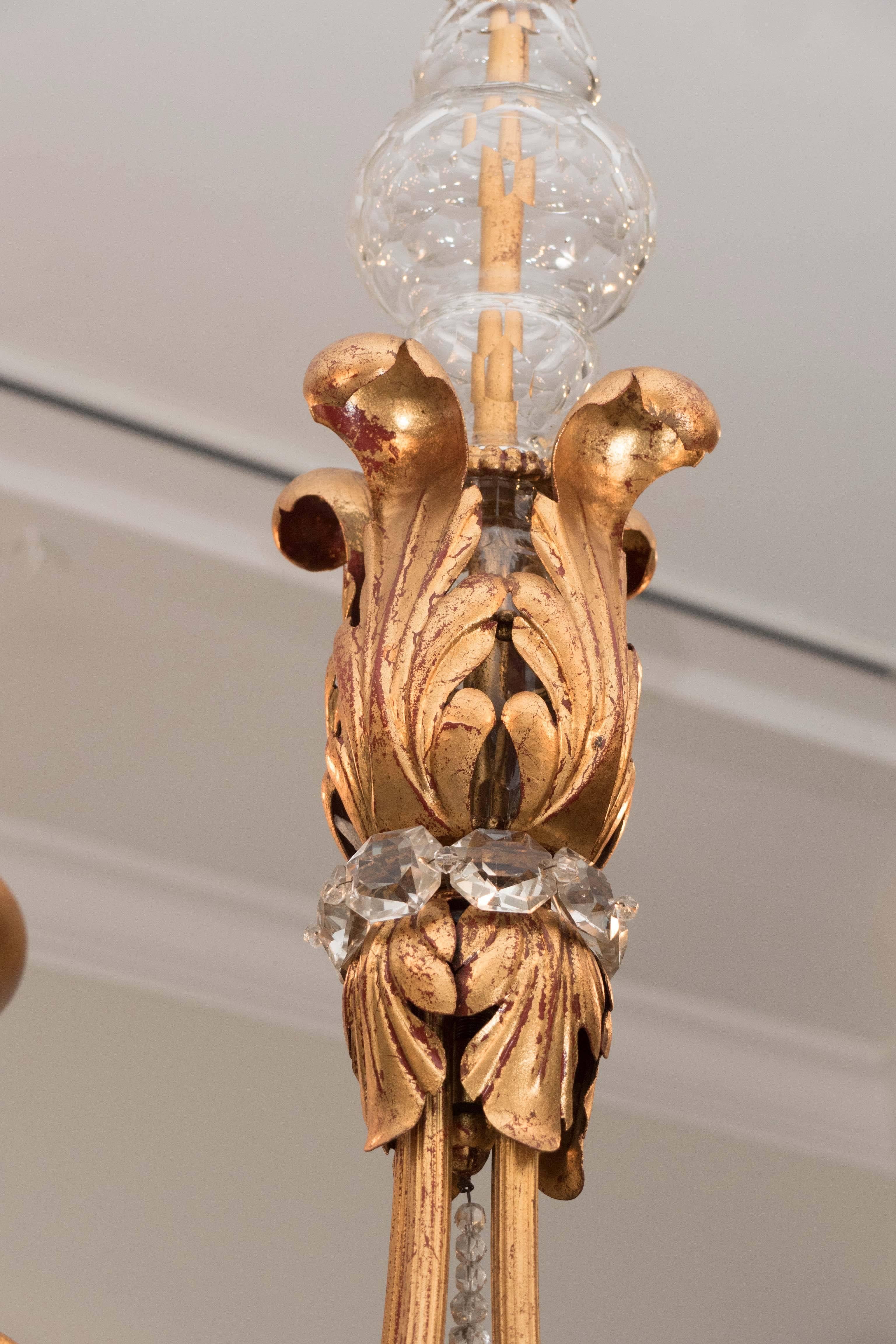 French  Four-Arm Gilt Metal and Crystal Chandelier In Excellent Condition In New York, NY