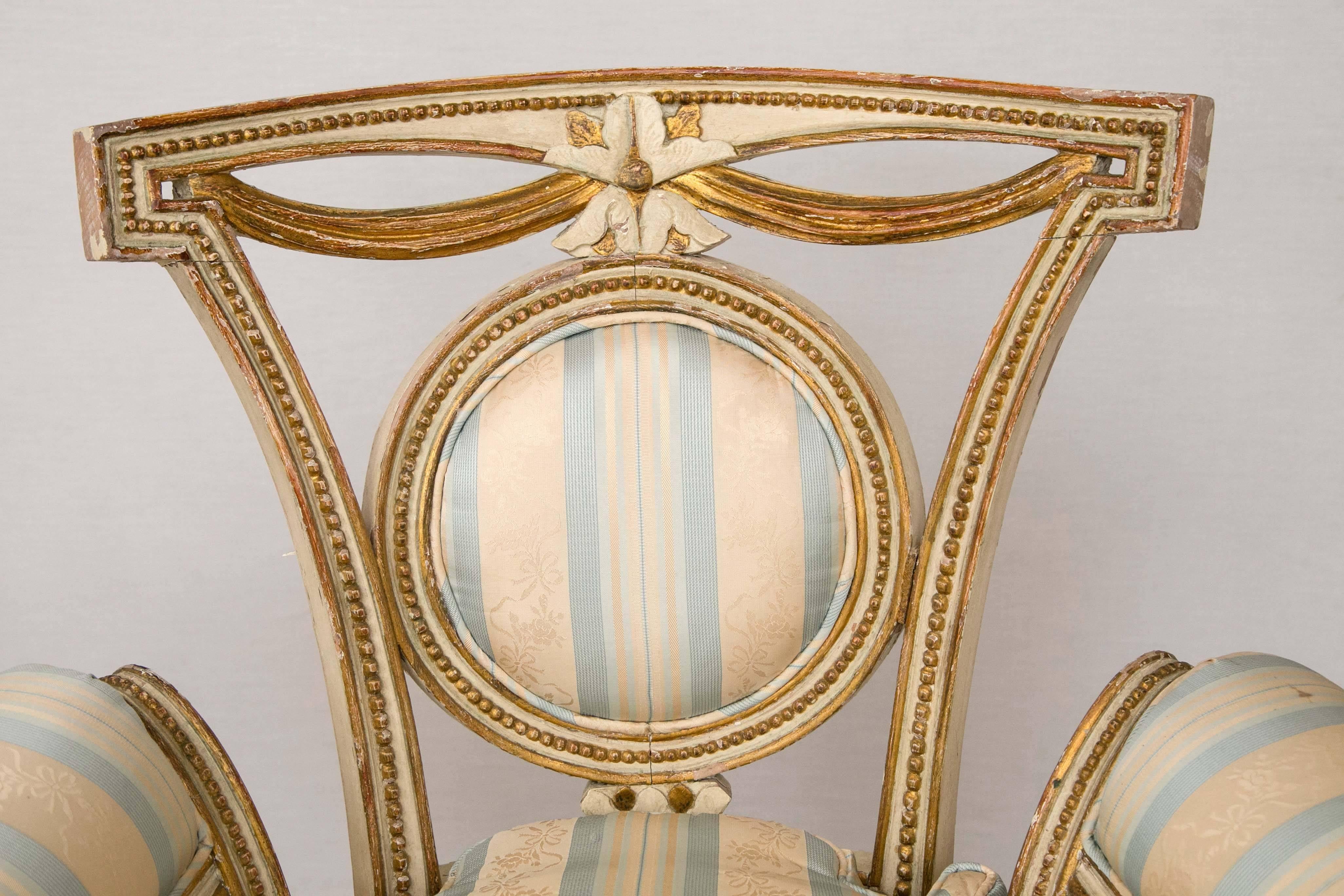 French Pair of Louis XVI Style Parcel-Gilt Upholstered Fauteuils For Sale