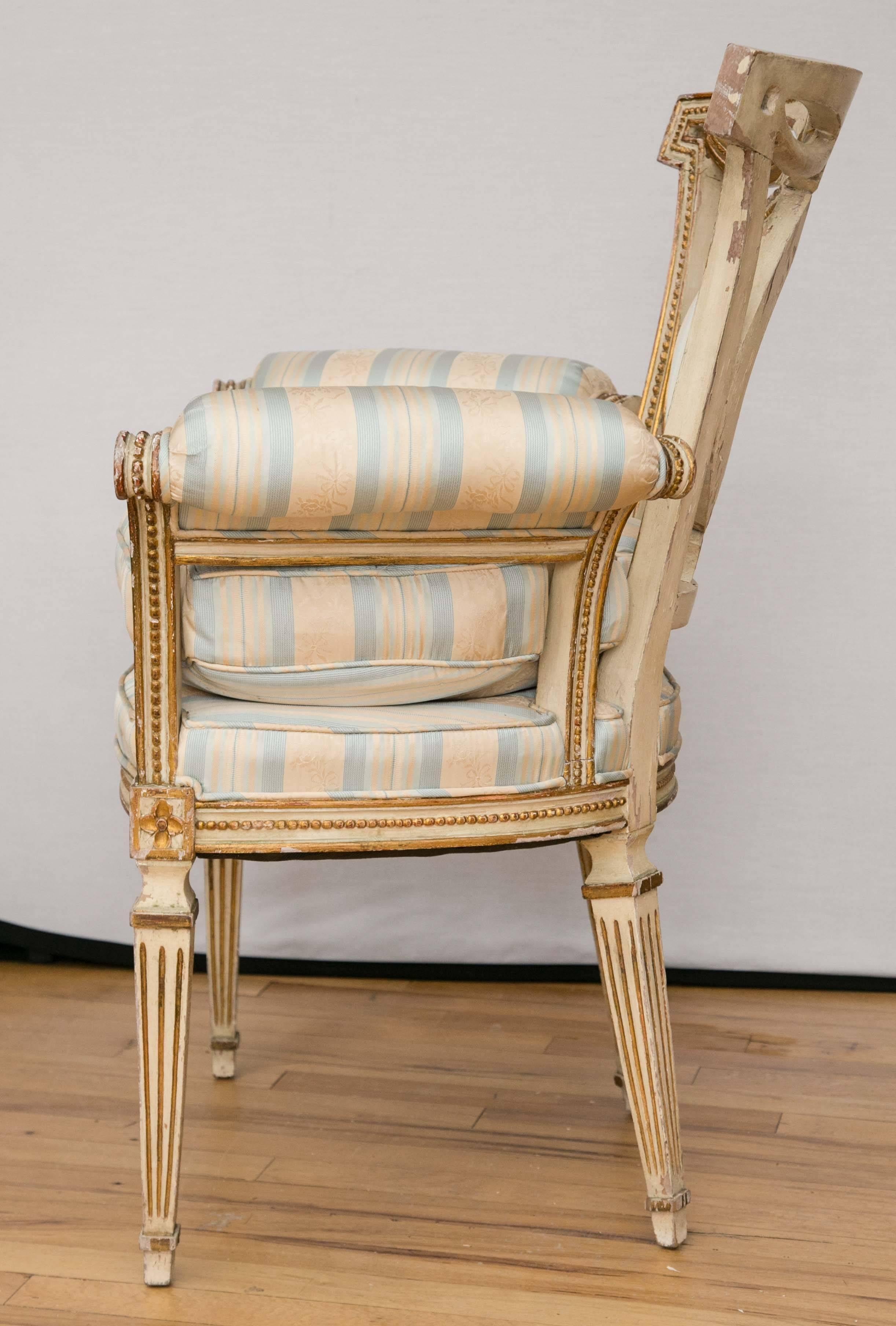 19th Century Pair of Louis XVI Style Parcel-Gilt Upholstered Fauteuils For Sale