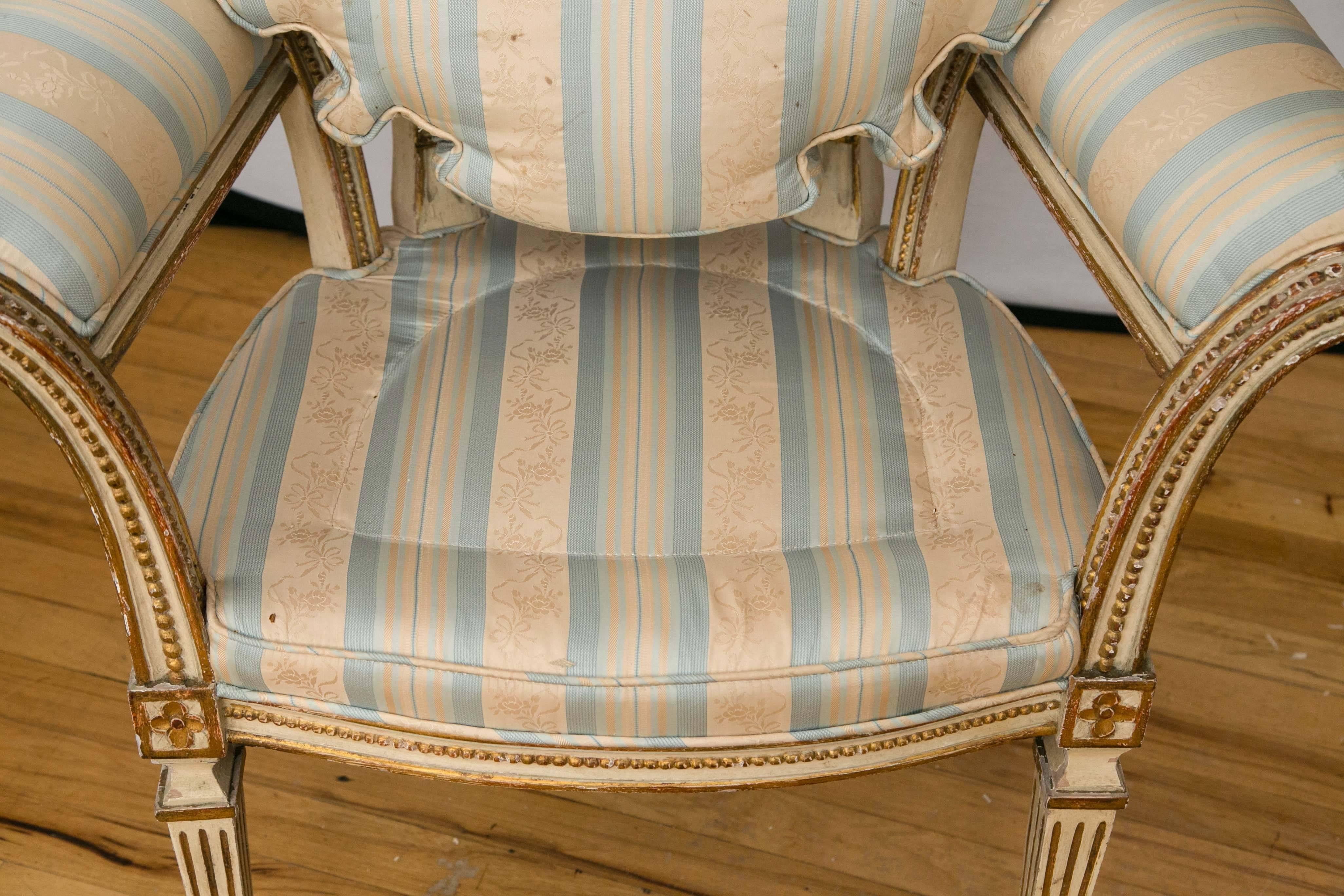 Pair of Louis XVI Style Parcel-Gilt Upholstered Fauteuils For Sale 3