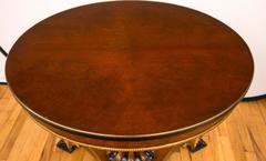 Pair of Regency Style Parcel Gilt and Ebonized Pedestal Tables