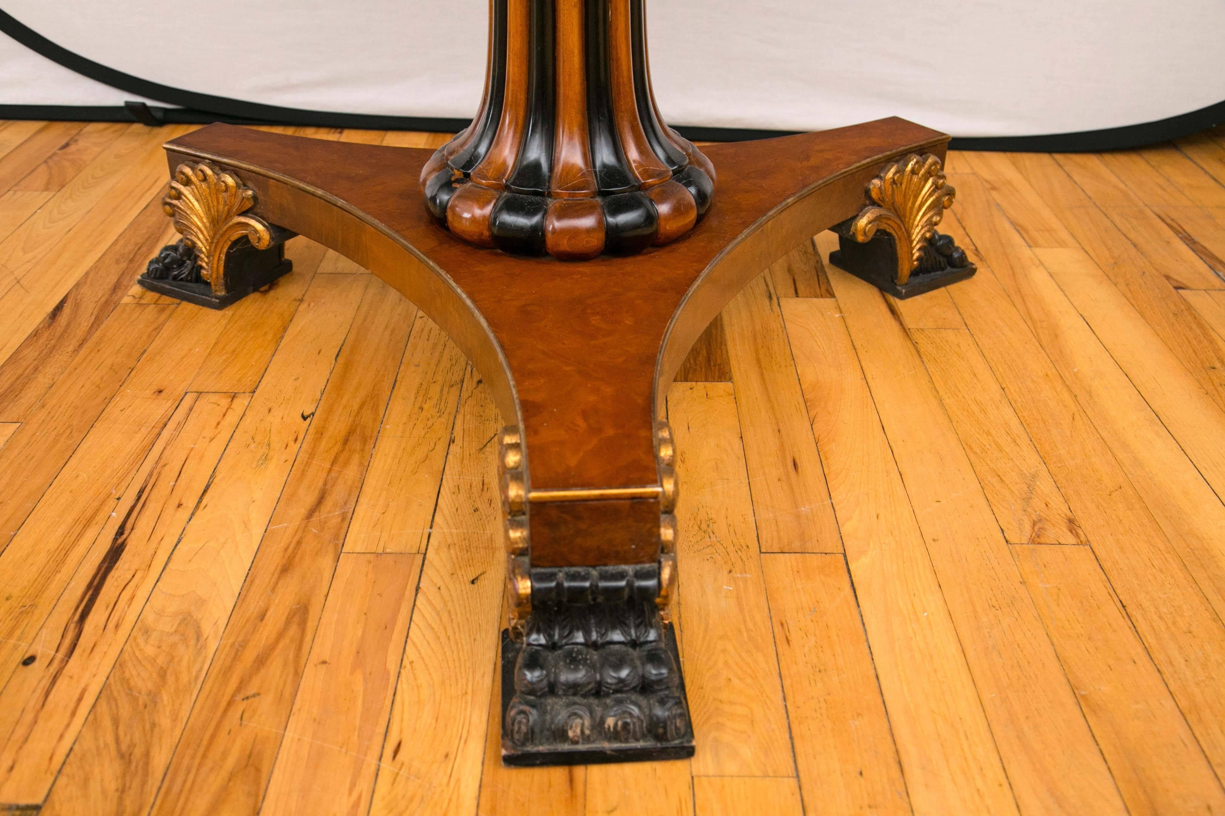 20th Century Pair of Regency Style Parcel Gilt and Ebonized Pedestal Tables