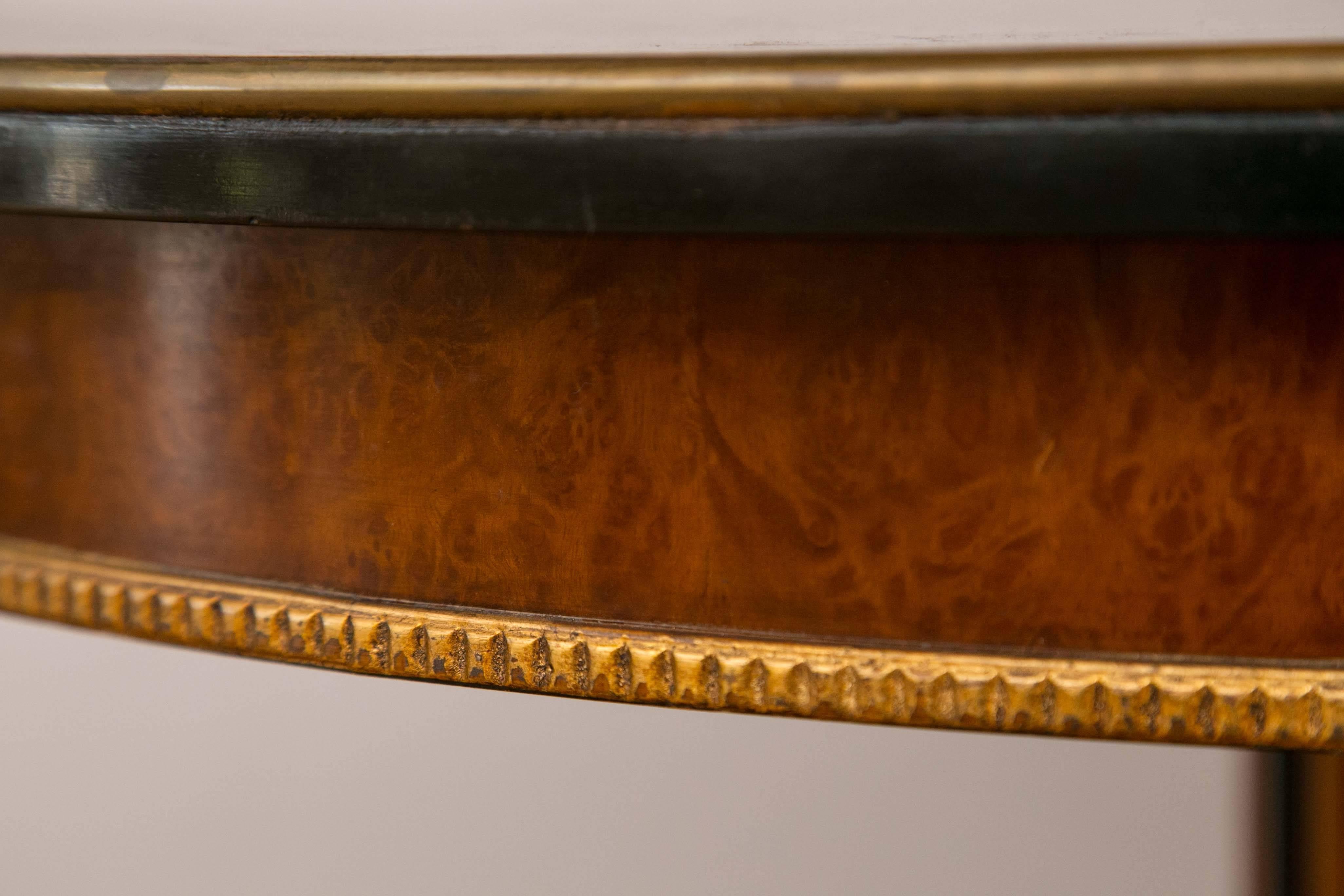 Pair of Regency Style Parcel Gilt and Ebonized Pedestal Tables 1