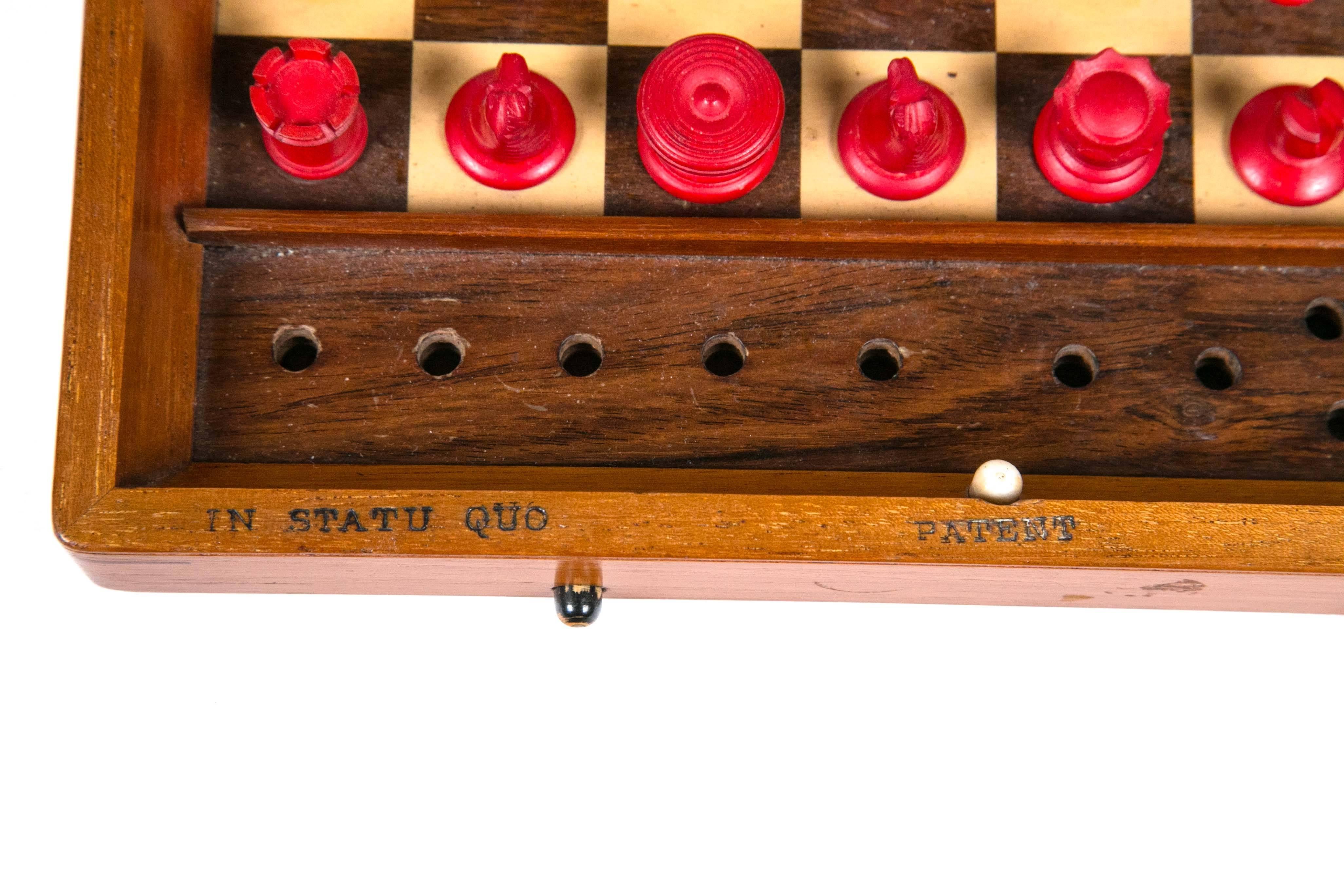English 1870 mahogany chess game signed Jaques/London.
One of several antiques we have acquired from a private collector.
Closes into a terrific looking travel box, the chest set has pieces that lock into place so when you carry and travel, they