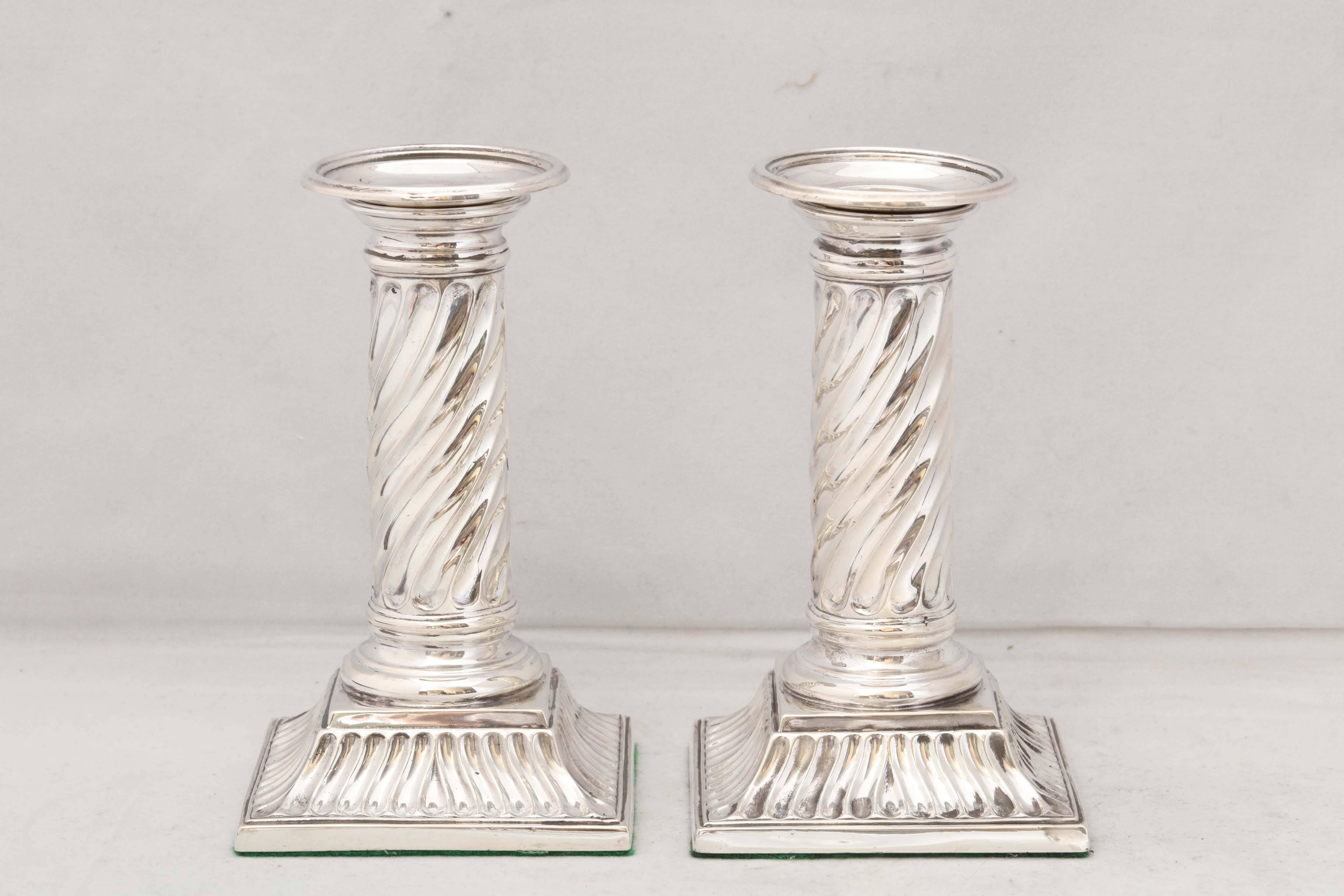 Lovely, unusual pair of Victorian, sterling silver, neoclassical column - form candlesticks, London, 1889, Richard Martin & Ebenezer Hall - makers. Fluted bases. Columns are 