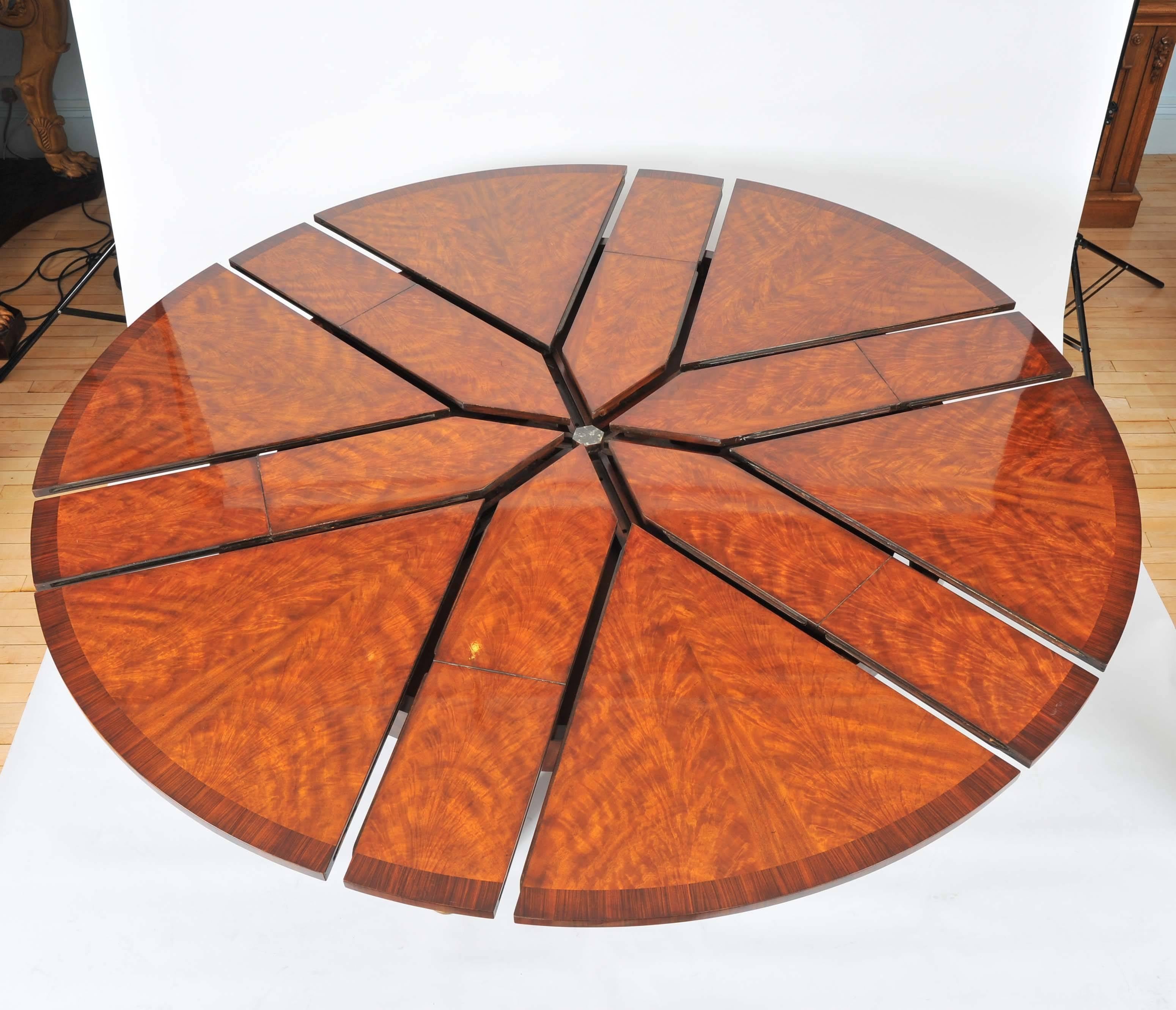 Contemporary Flame Mahogany Segmented Circular Extending Table 