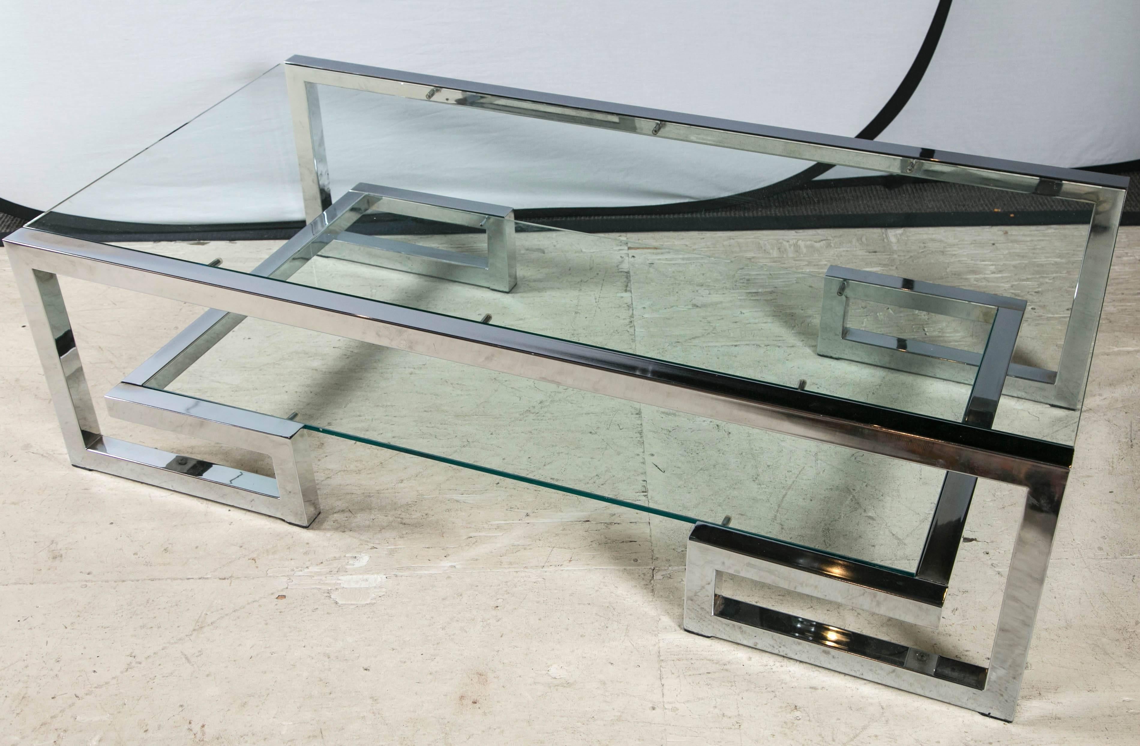 Mid-Century two-tier glass and chrome coffee table.