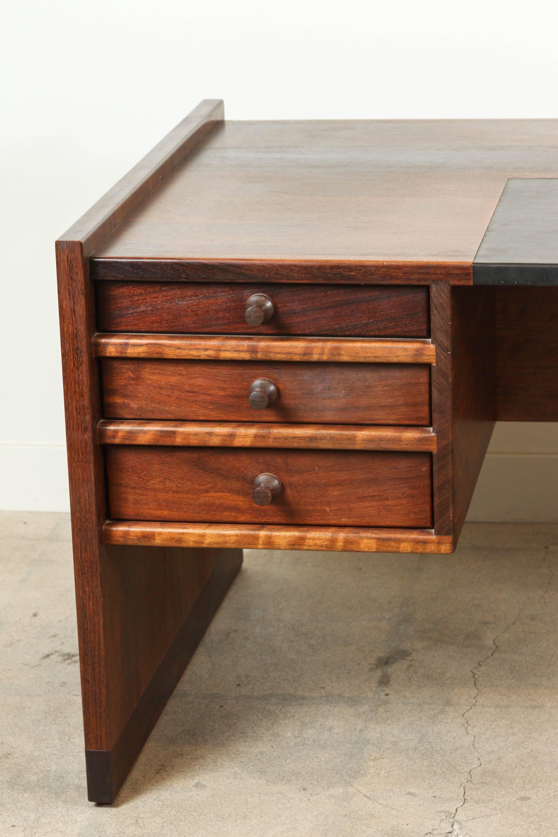 Solid walnut and leather desk by John Nyquist. Custom commissioned in 1965.