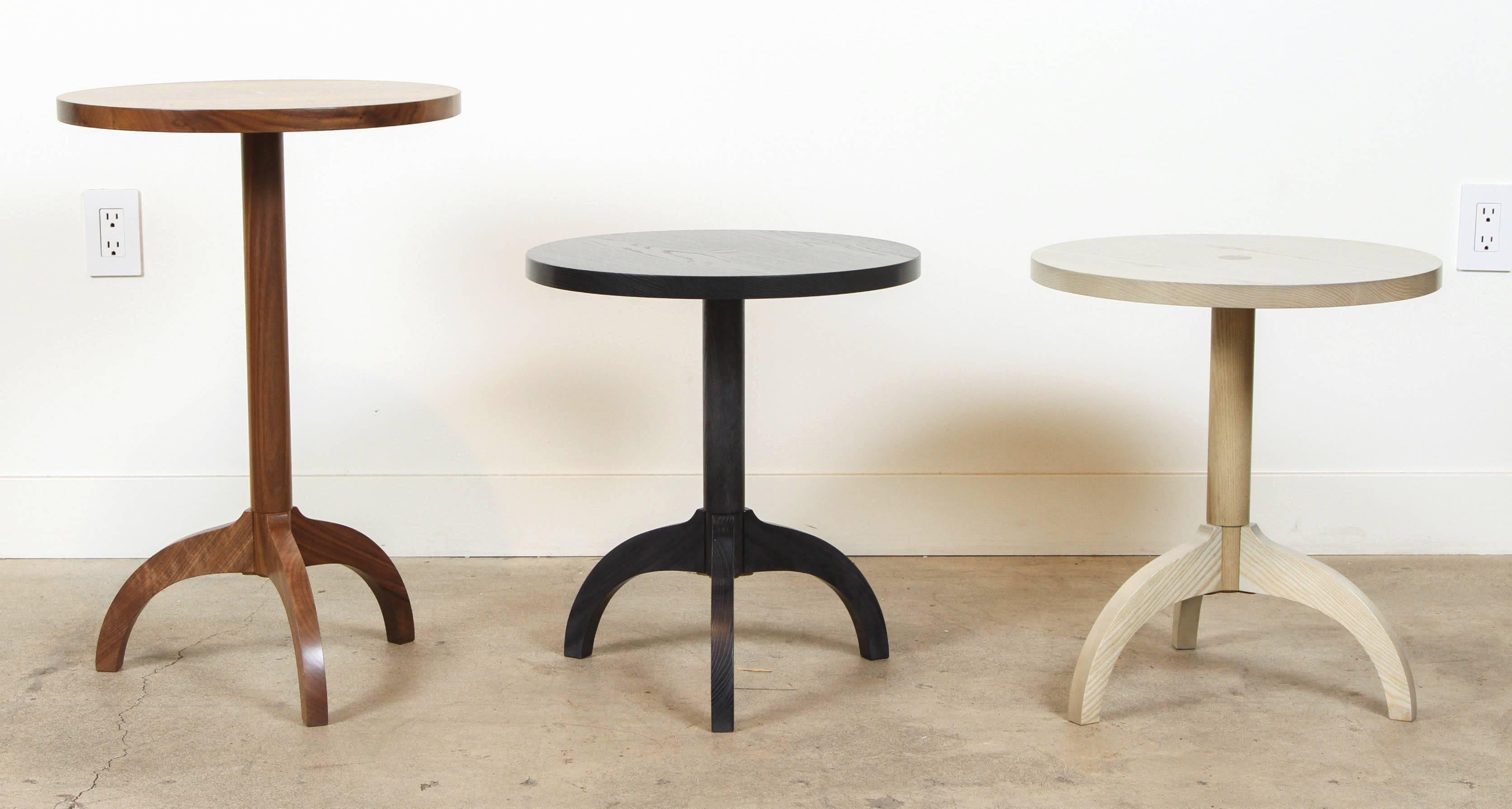Tripod table by O&G Studio. Comes in two sizes and various finishes. Check for availability. 

Tall: $620.
Dimensions: 18