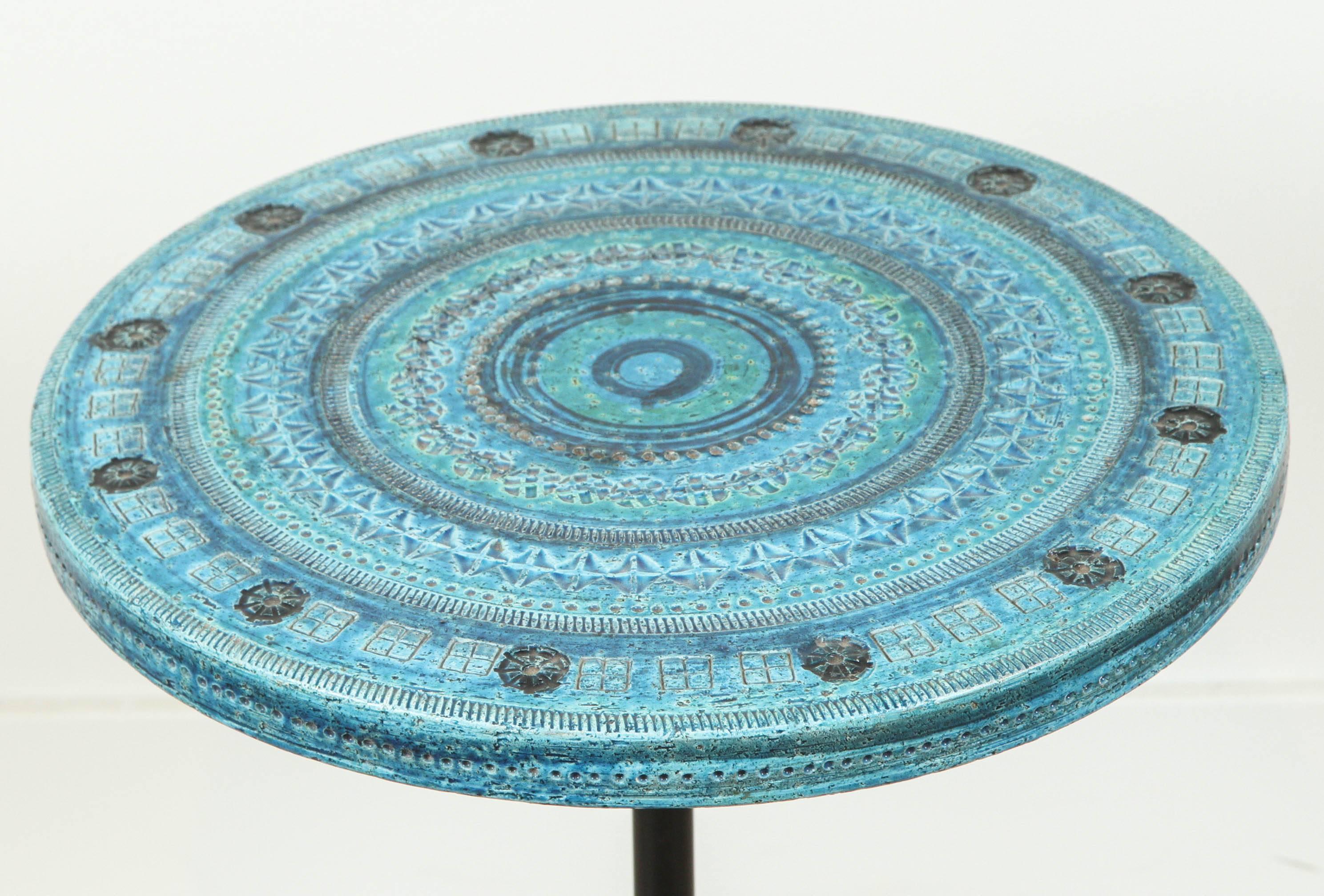 Rimini blue ceramic side table by Aldo Londi for Bitossi.

Adjustable height.