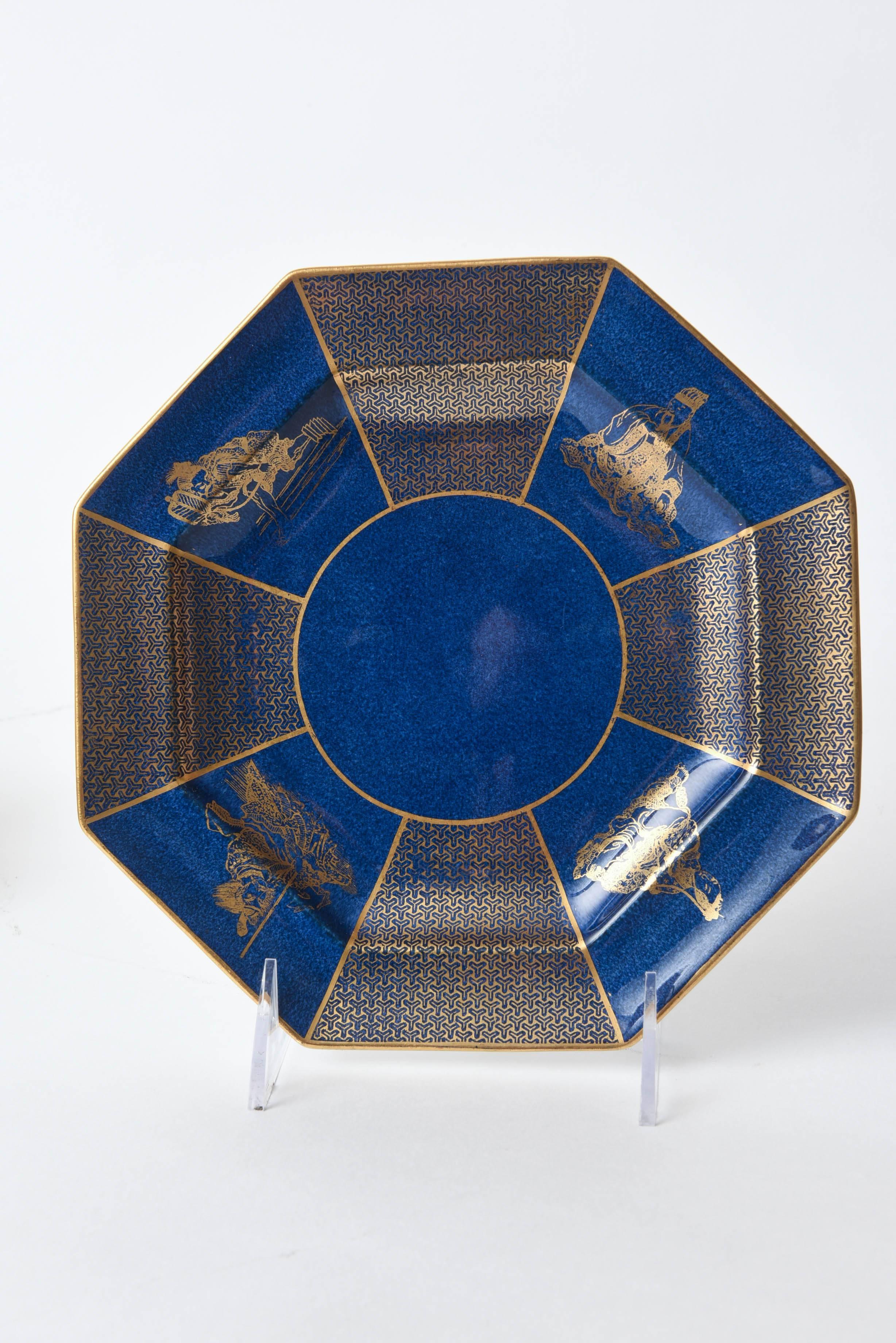 An interesting octagonal-shaped set of crushed lapis blue plates with a delightful Chinoisserie pattern on the rich royal blue ground. Custom ordered through the fine retailer of William Plummer New York in the early 1900s. Wonderful antique
