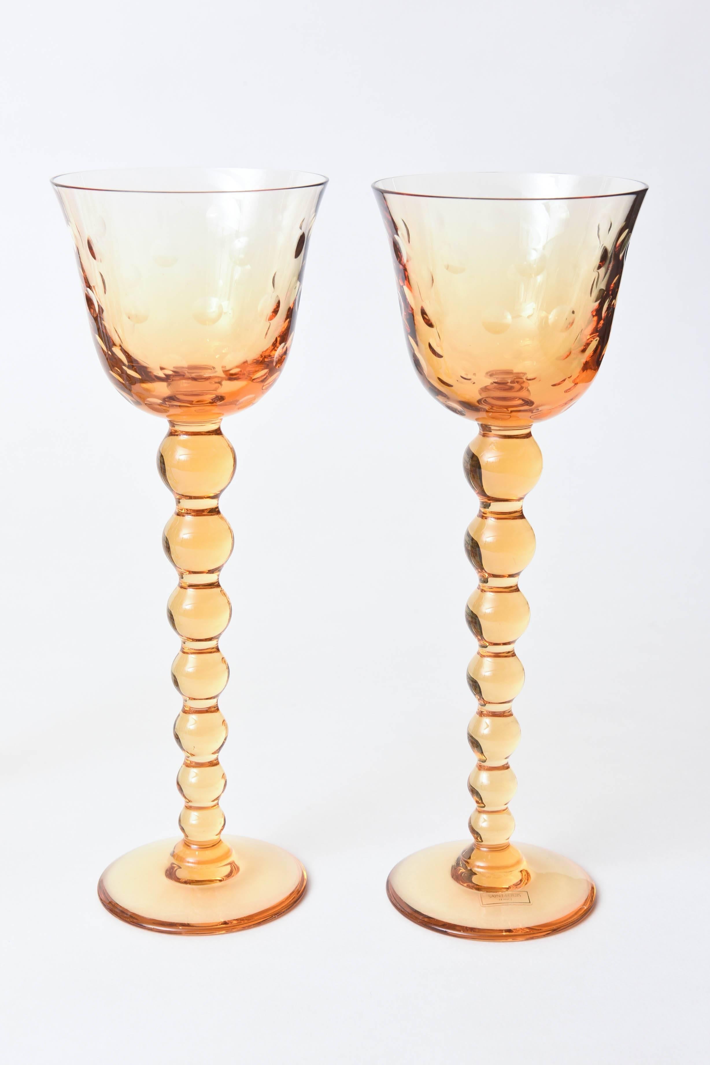 A wonderful set of fine crystal goblets from the storied crystal firm of Saint Louis, France. This is their signature 