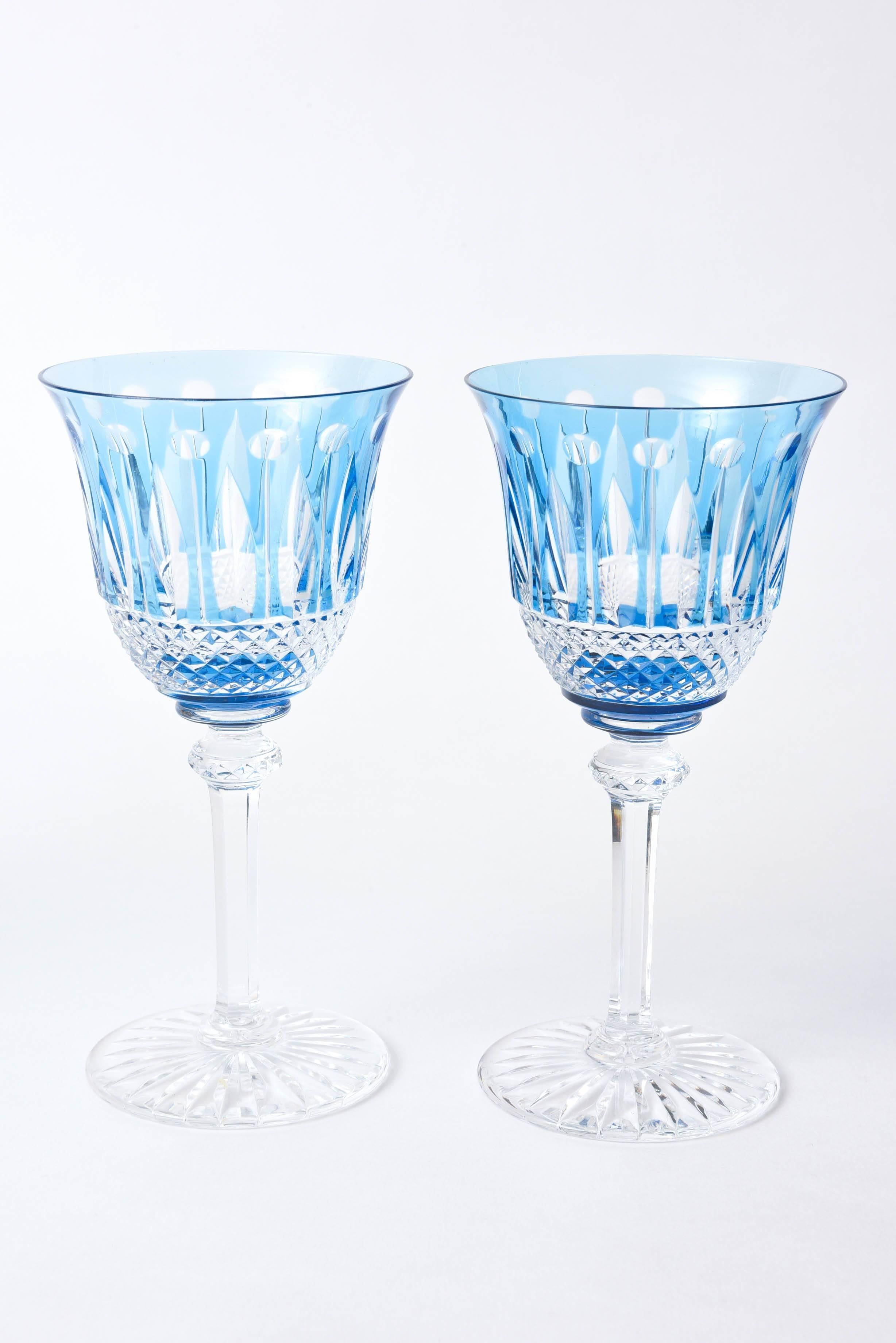 One of their prettiest colors, Sky Blue in Saint Louis, France's signature shape goblet. This pattern features a cut knob stem, cross hatching and an interesting geometric cut to clear on the bowl of the elongated stem. We have nine total and are