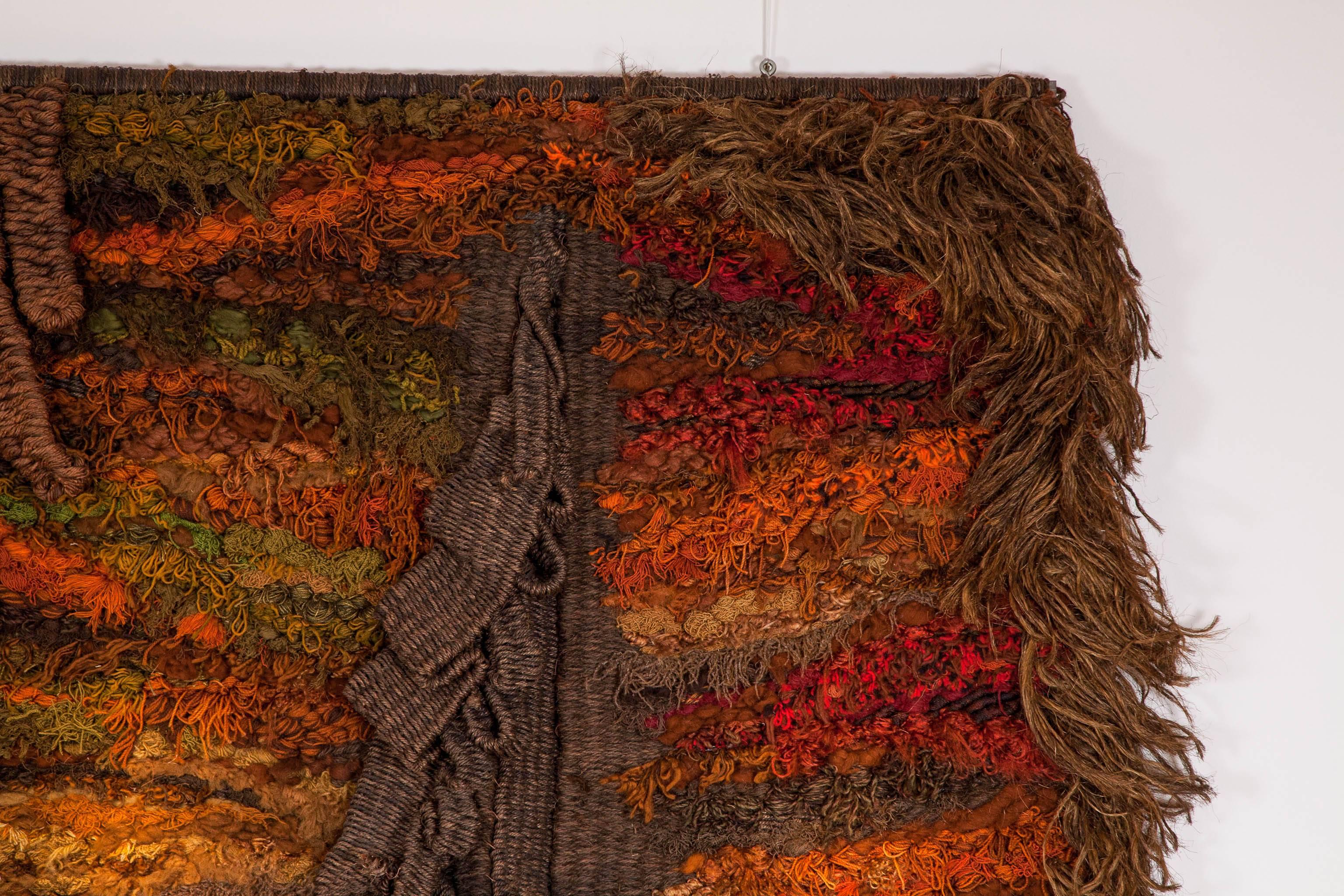 'Noyau' (Nucleus) tapestry by Veerle Dupont (b. 1942, Belgian), 1979.
Mixed natural fibres are woven in abstract, sculptural design. Various weaving techniques were employed to enhance the effects of the different materials, resulting in a unique