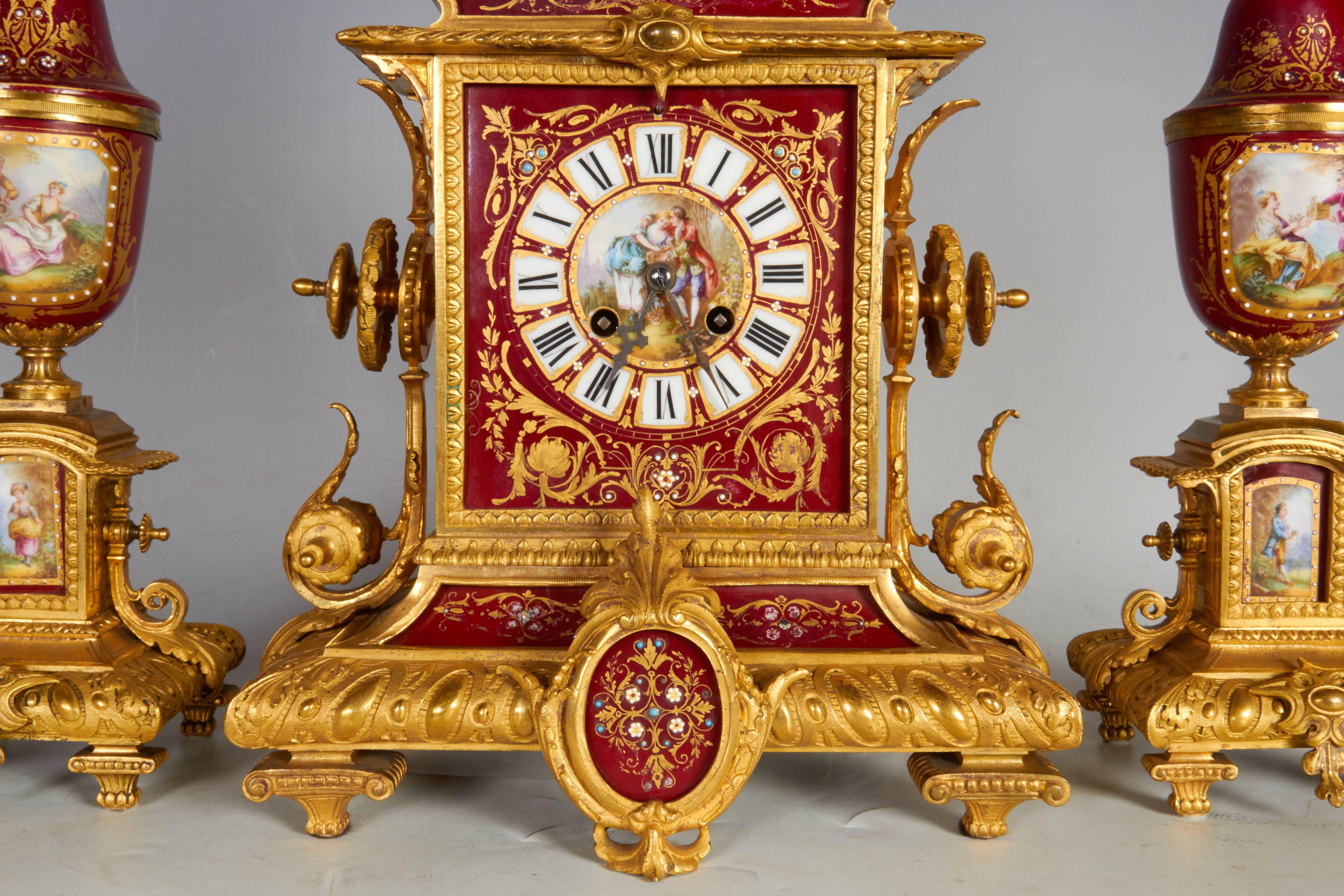 Louis XVI Ormolu-Mounted Sevres Style Ruby Ground, Jeweled Three-Piece Clock Garniture