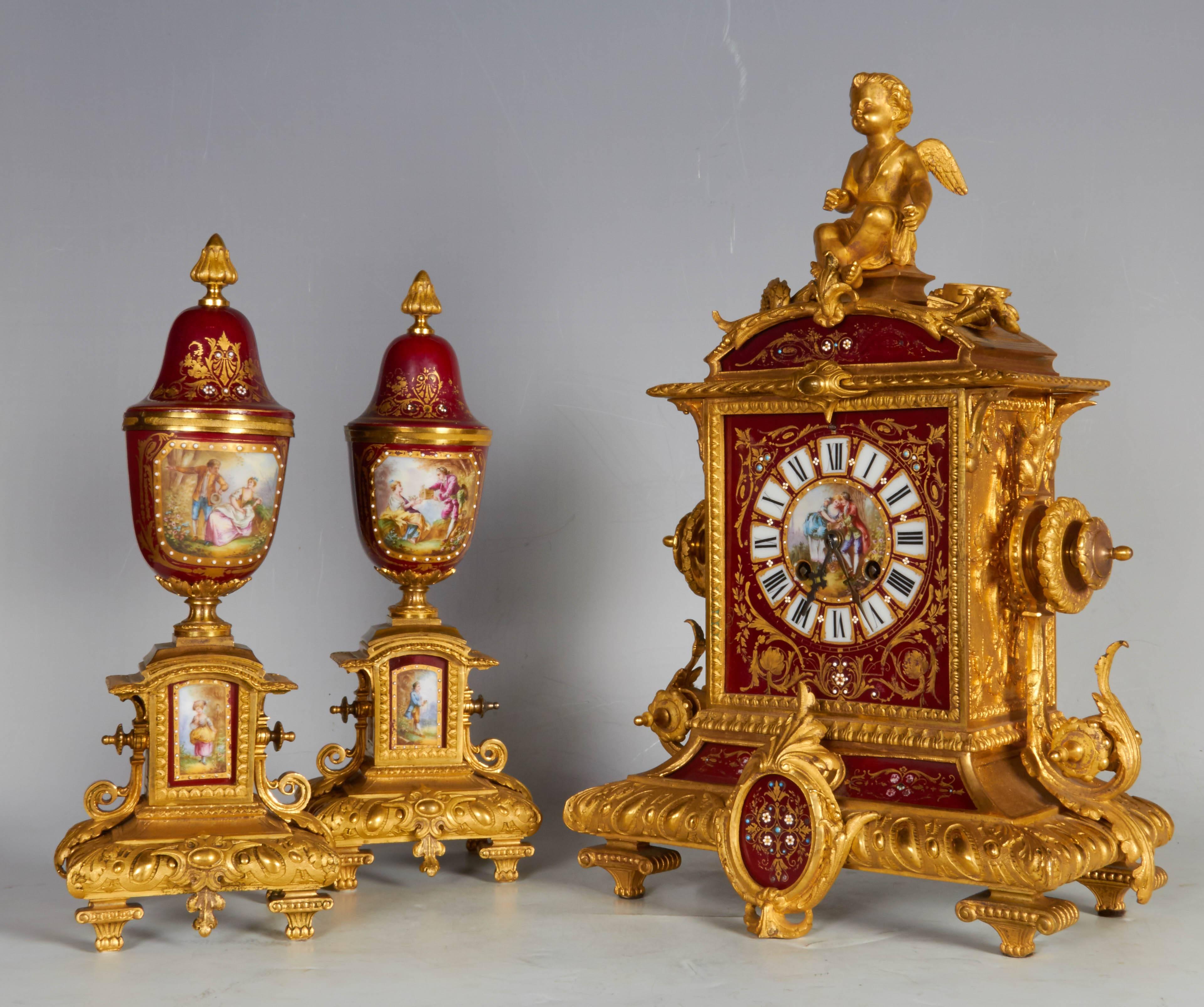 Ormolu-Mounted Sevres Style Ruby Ground, Jeweled Three-Piece Clock Garniture In Excellent Condition In New York, NY