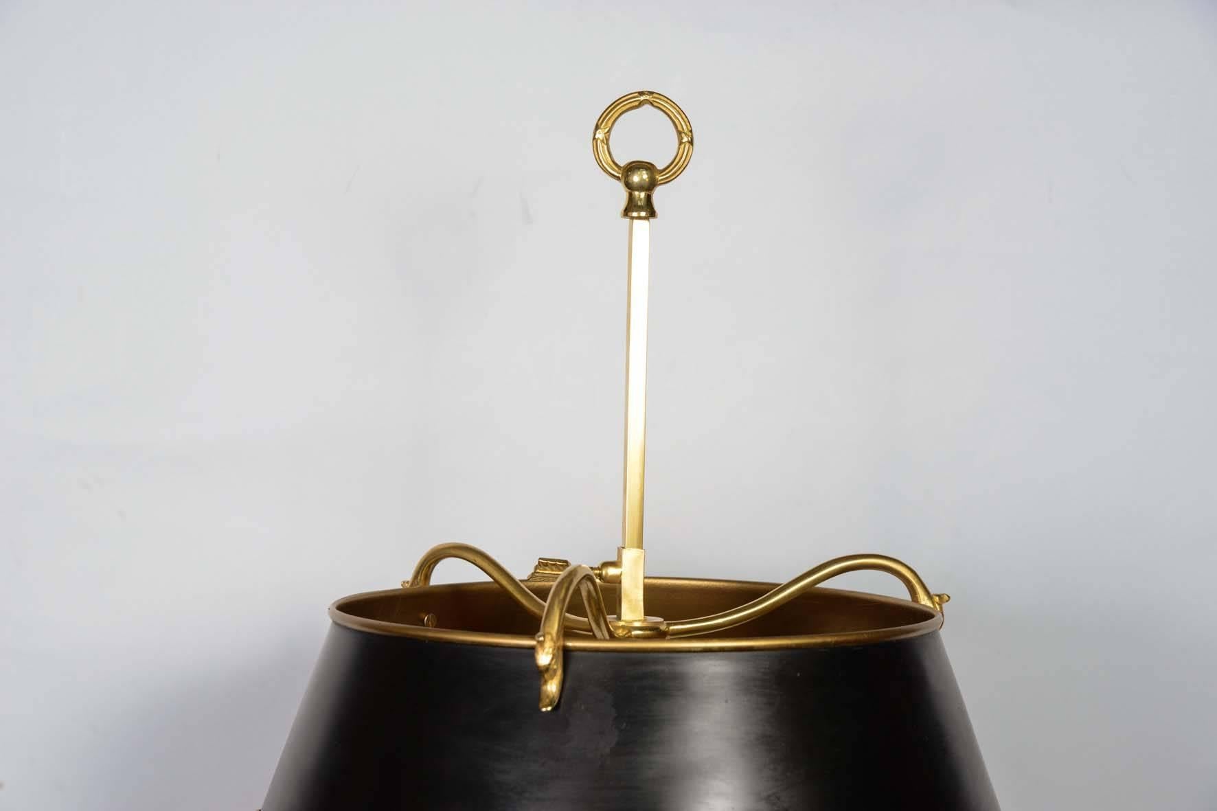 2 Bouillotte lamps Empire style, three lights.
Bronze gilded, lamps shade in painted metal ornamented with gilt bronze.

Base diameter 9