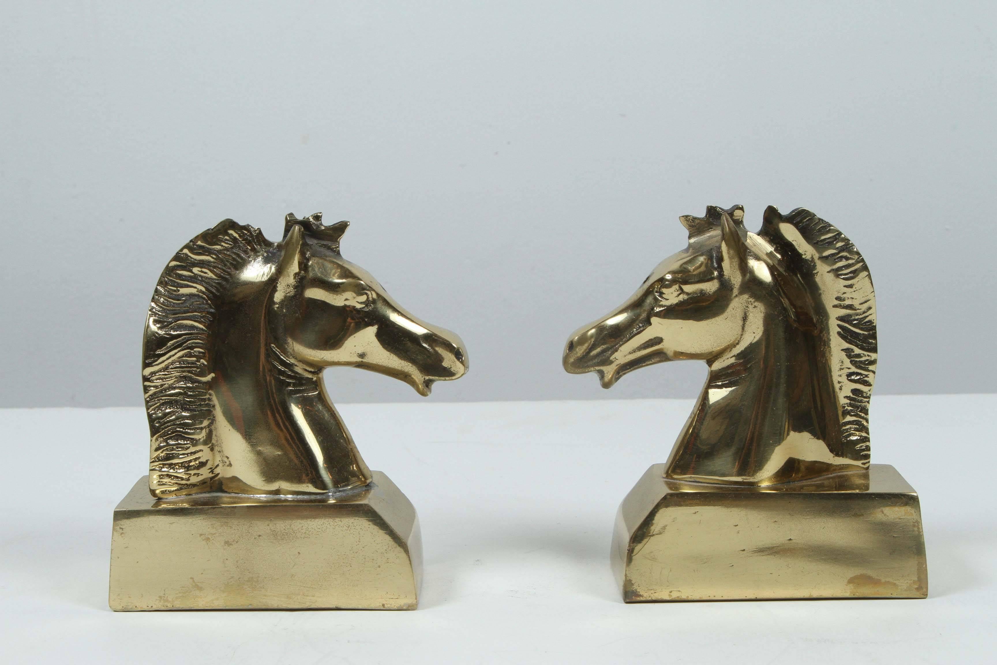 Pair of polished brass horse head bookends paperweights.
Great brass decorative art objects.
Will make a great gift.