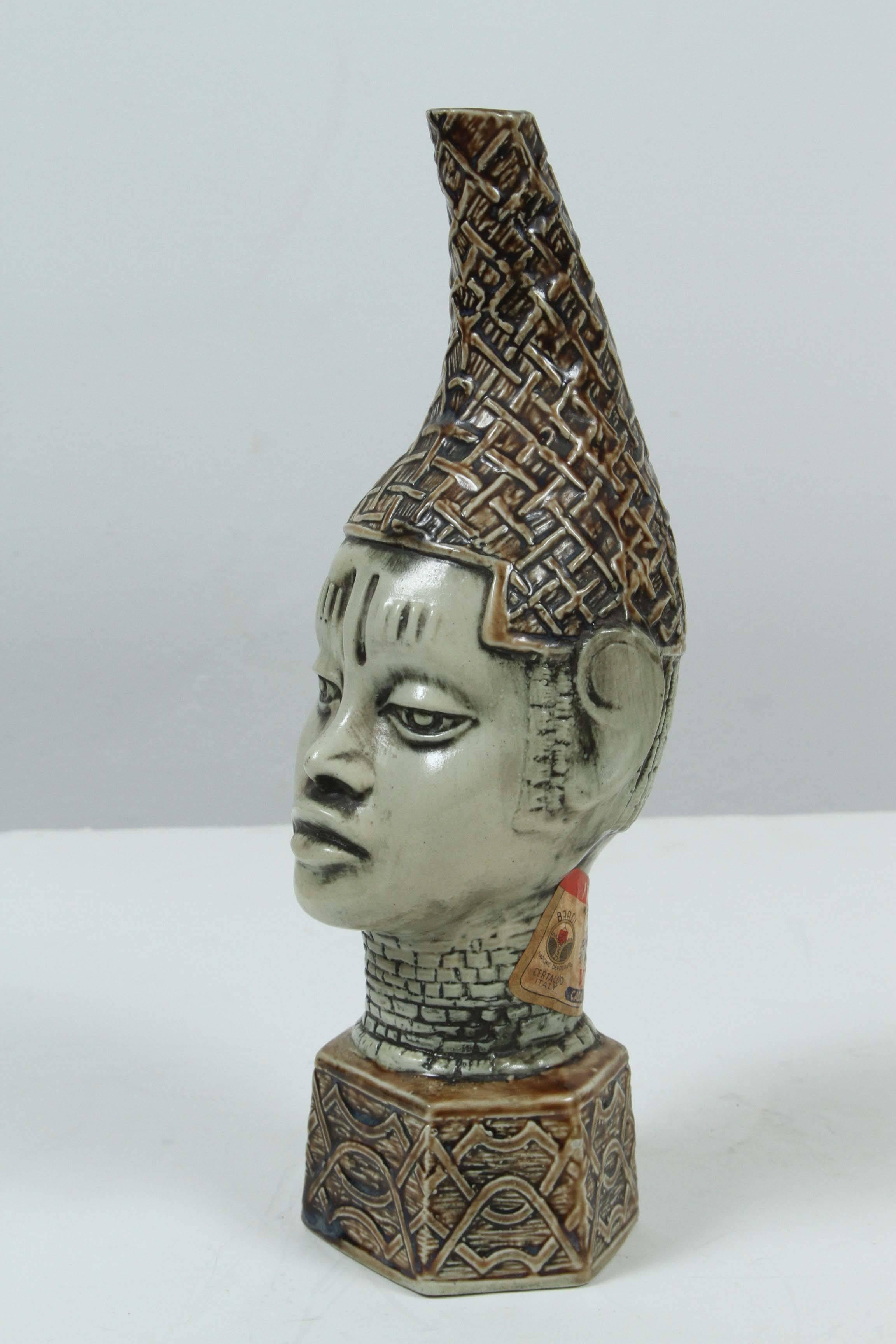 Handmade and hand-painted in Italy, ceramic figure of African Queen mother.
A 20th century Benin Queen Mother commemorative head by the Edo people (present day Nigeria, Africa). 
Made after a bronze Benin sculpture of 