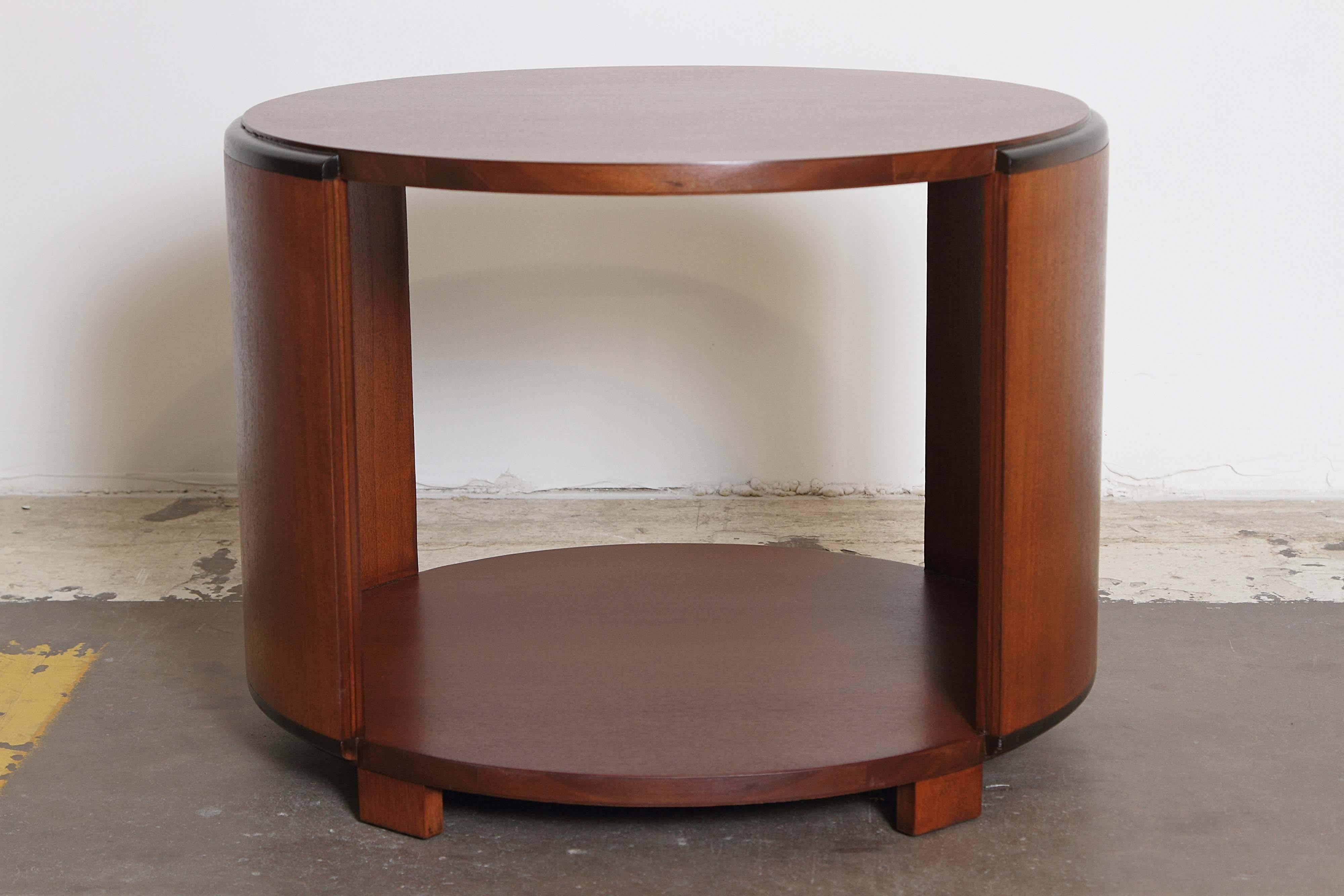 Difficult to source early Rohde line for H-M, especially this classic Rohde occasional table form.
Refinished to original specs, with partial ebonized accents.
H-M catalog #5265, circa 1935.
A tropical West African wood, one of the exotic veneers